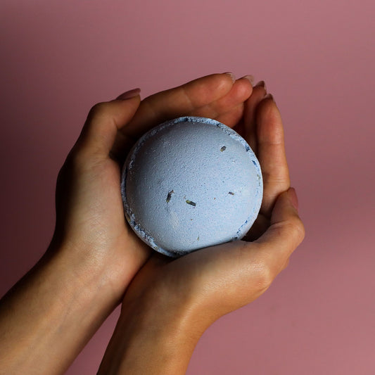 Set of 3 Jumbo Lavender and Seeds Bath Bombs by The Bliss Co, showcasing 180g colorful, scented bath bombs with lavender and seed accents.