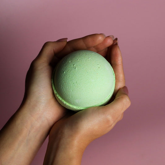 Set of 3 lemon eucalyptus jumbo bath bombs by The Bliss Co, 180g each, with colorful, round bath bombs displayed on a white background.