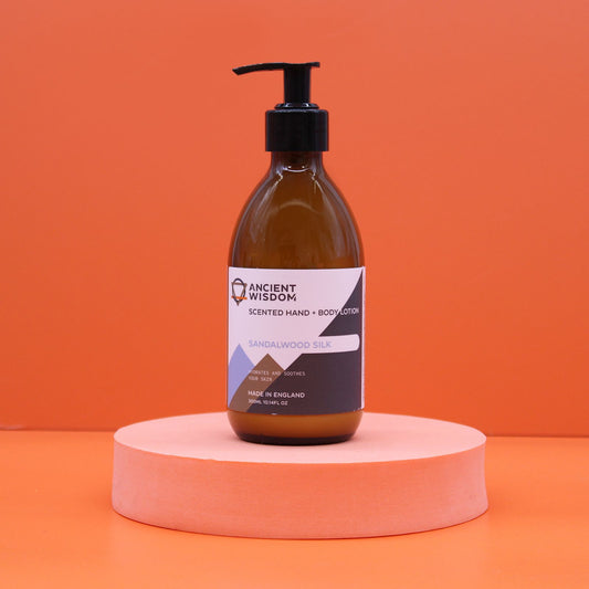 The Bliss Co Sandalwood Silk Lotion 300ml bottle, a fragranced hand and body lotion with a sleek design and elegant packaging.
