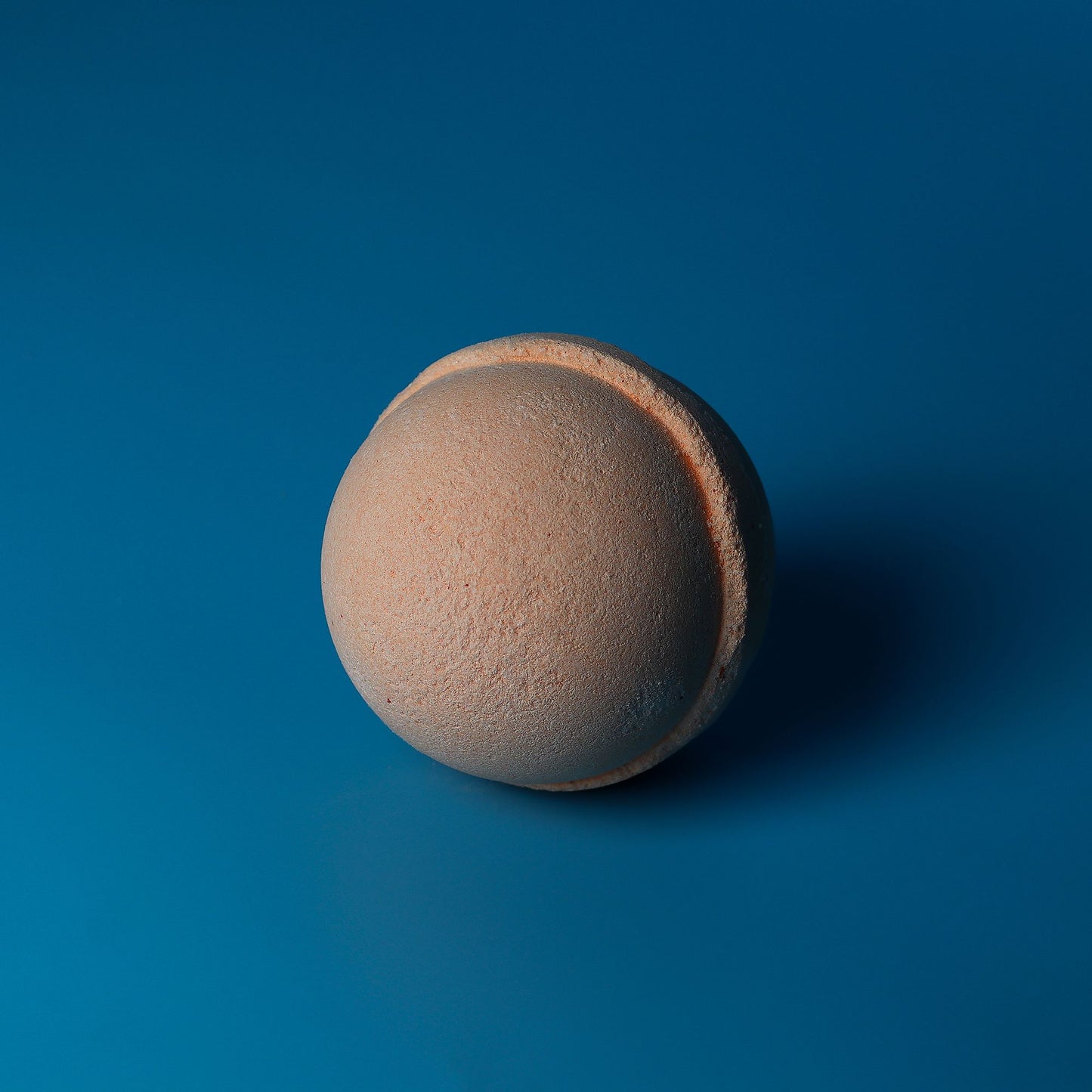 Set of 3 jumbo Tangerine and Grapefruit bath bombs by The Bliss Co, 180g each, with colorful citrus scents and vibrant packaging.
