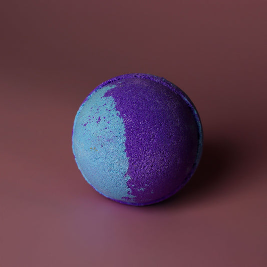 Jumbo Amethyst Creed bath bomb by The Bliss Co, 180g, with vibrant purple colors and a calming, gemstone-inspired design.