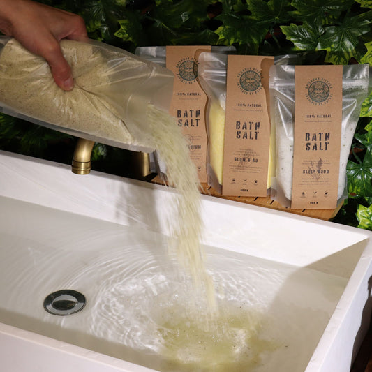 Greenman Rituals Menthol Aromatherapy Epsom Bath Salt for recovery by The Bliss Co, shown in a clear glass jar with the salts inside.