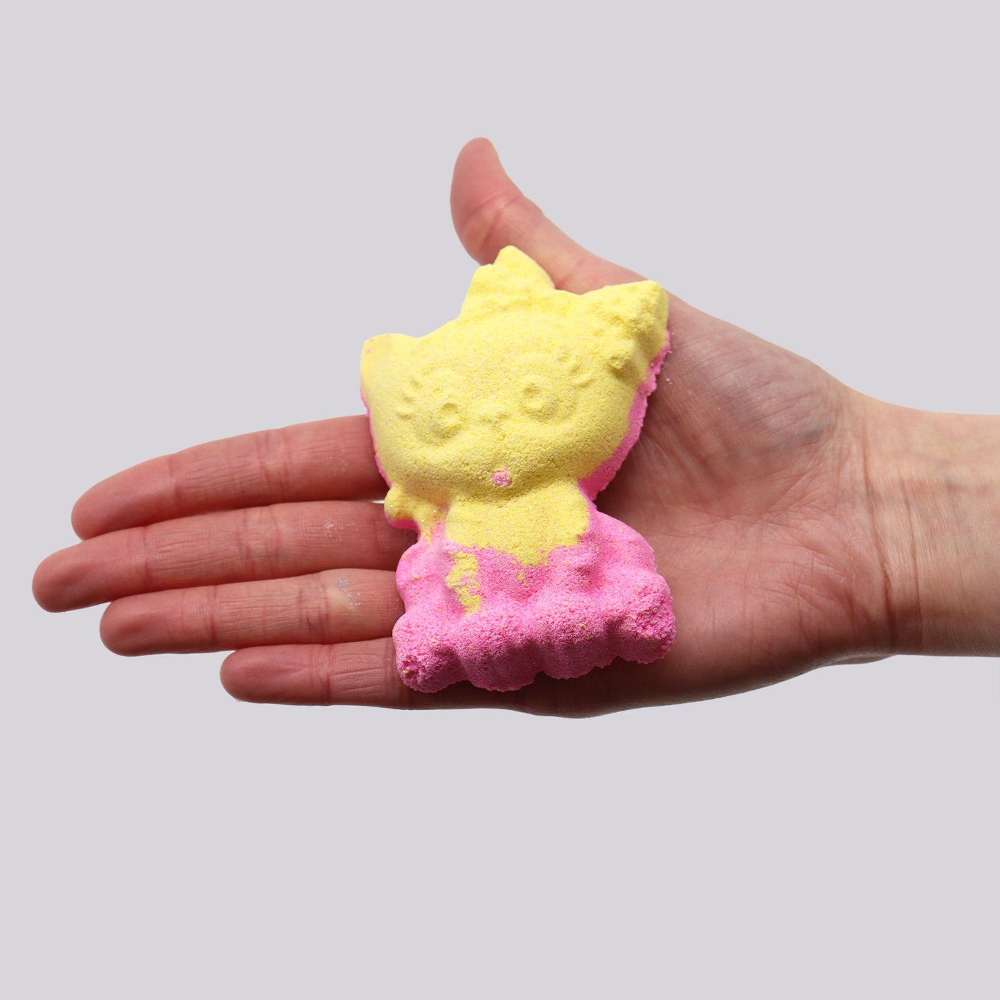 Colorful shaped cat bath bomb for kids from The Bliss Co, designed for fun bath time experiences.