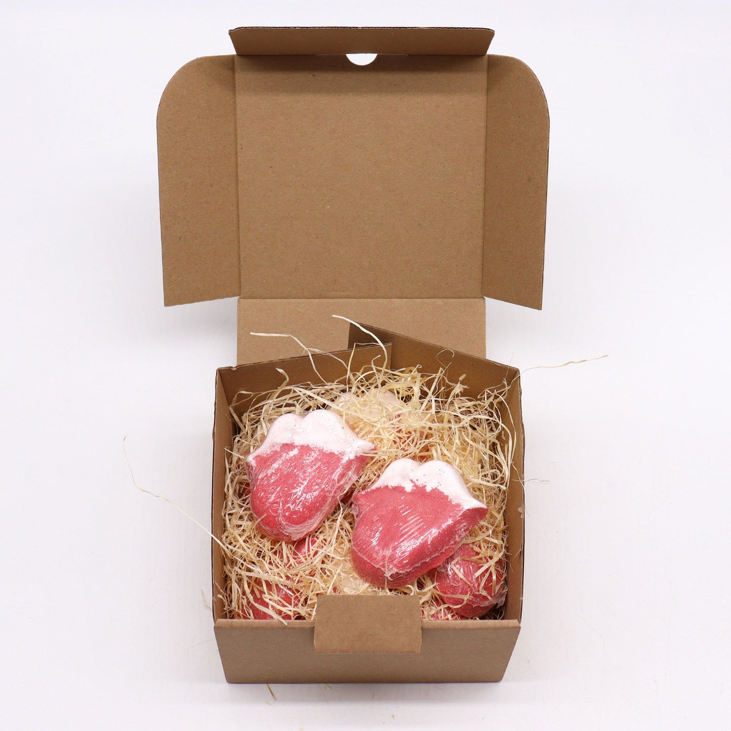 Colorful Lips-shaped bath bomb for kids by The Bliss Co, 60g, designed for fun and relaxing bath time.