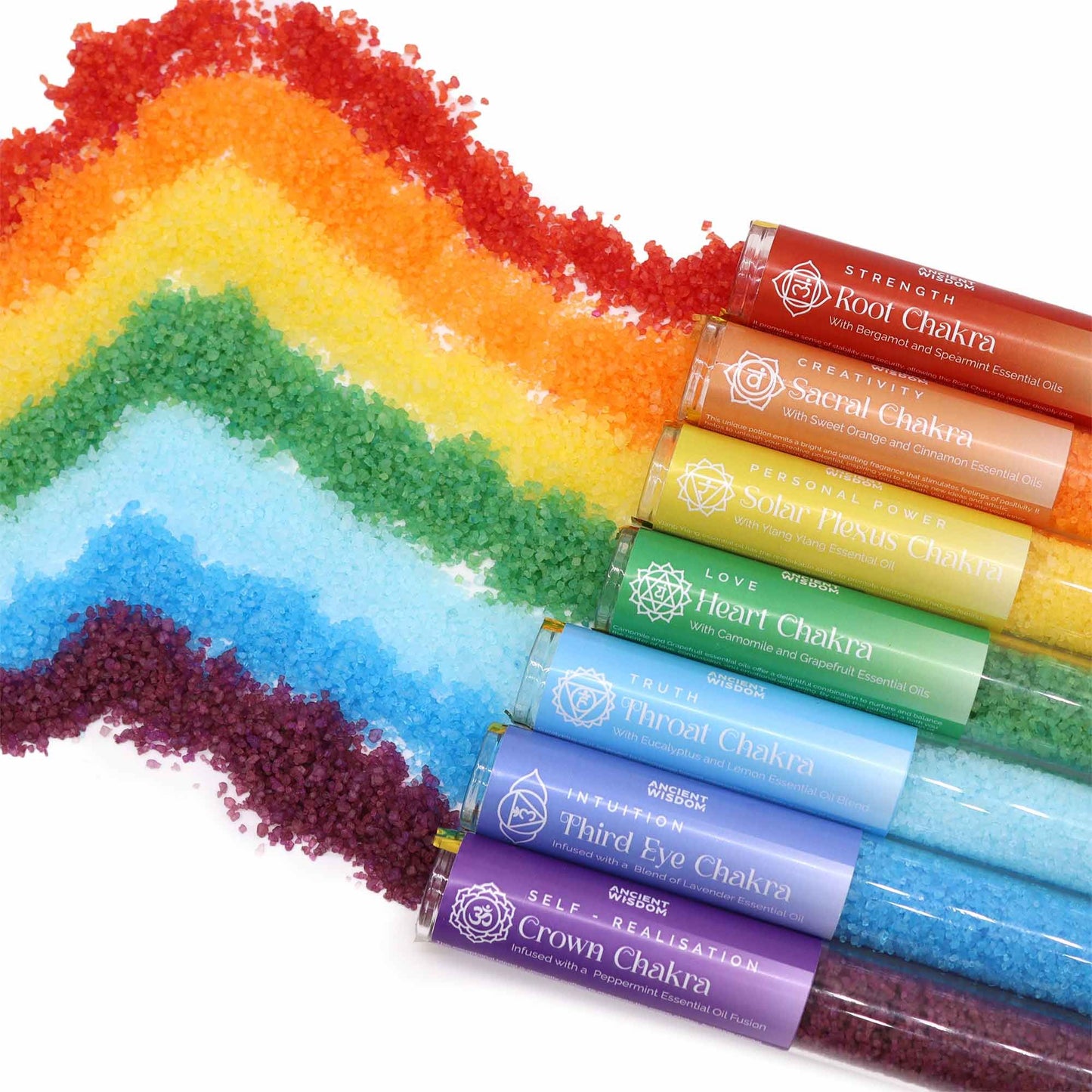 Chakra Bath Salt gift pack of 7 vials by The Bliss Co, featuring colorful bath salts in small glass vials for relaxing spa baths.