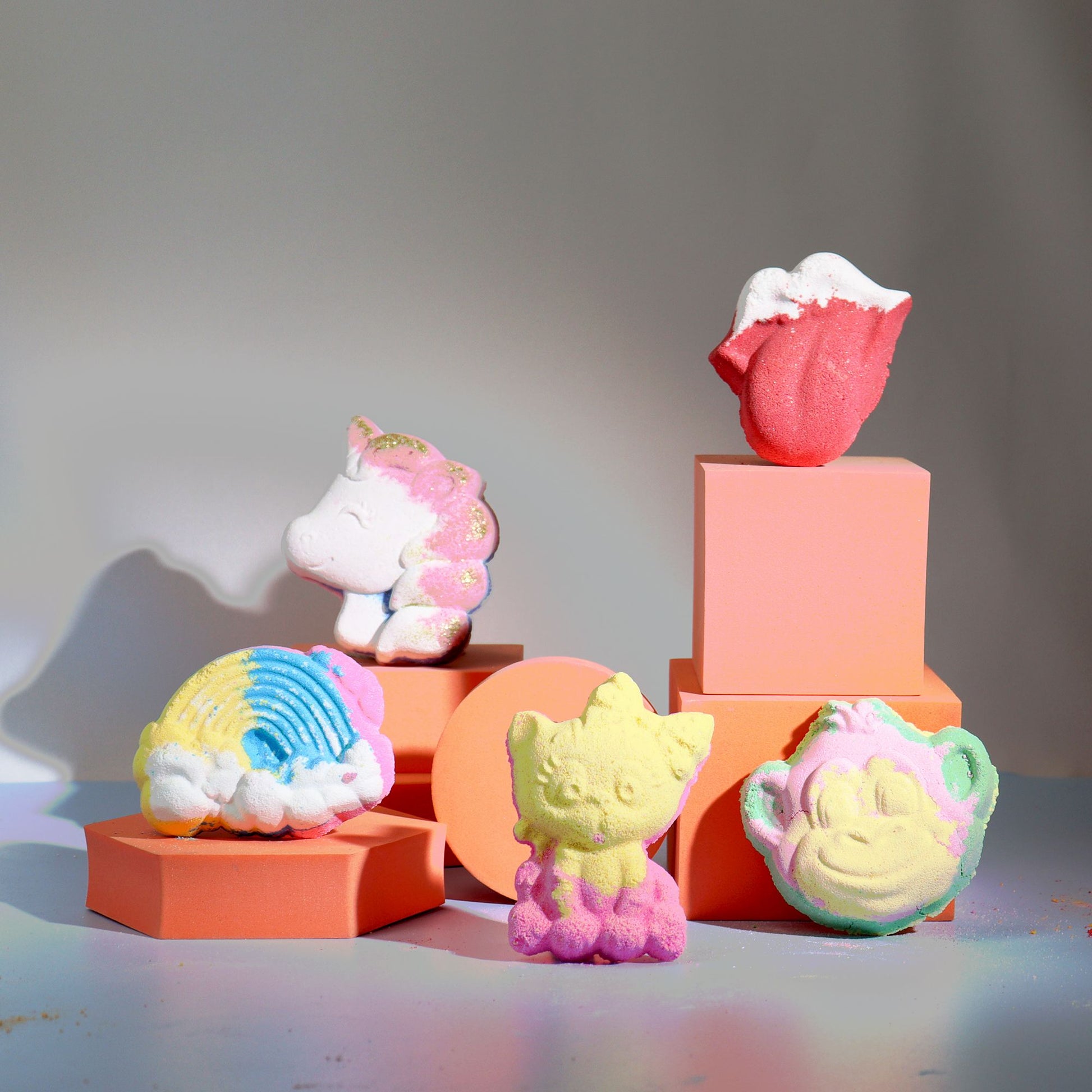Colorful cat-shaped bath bomb for kids by The Bliss Co, designed for fun bath time relaxation and sensory play.