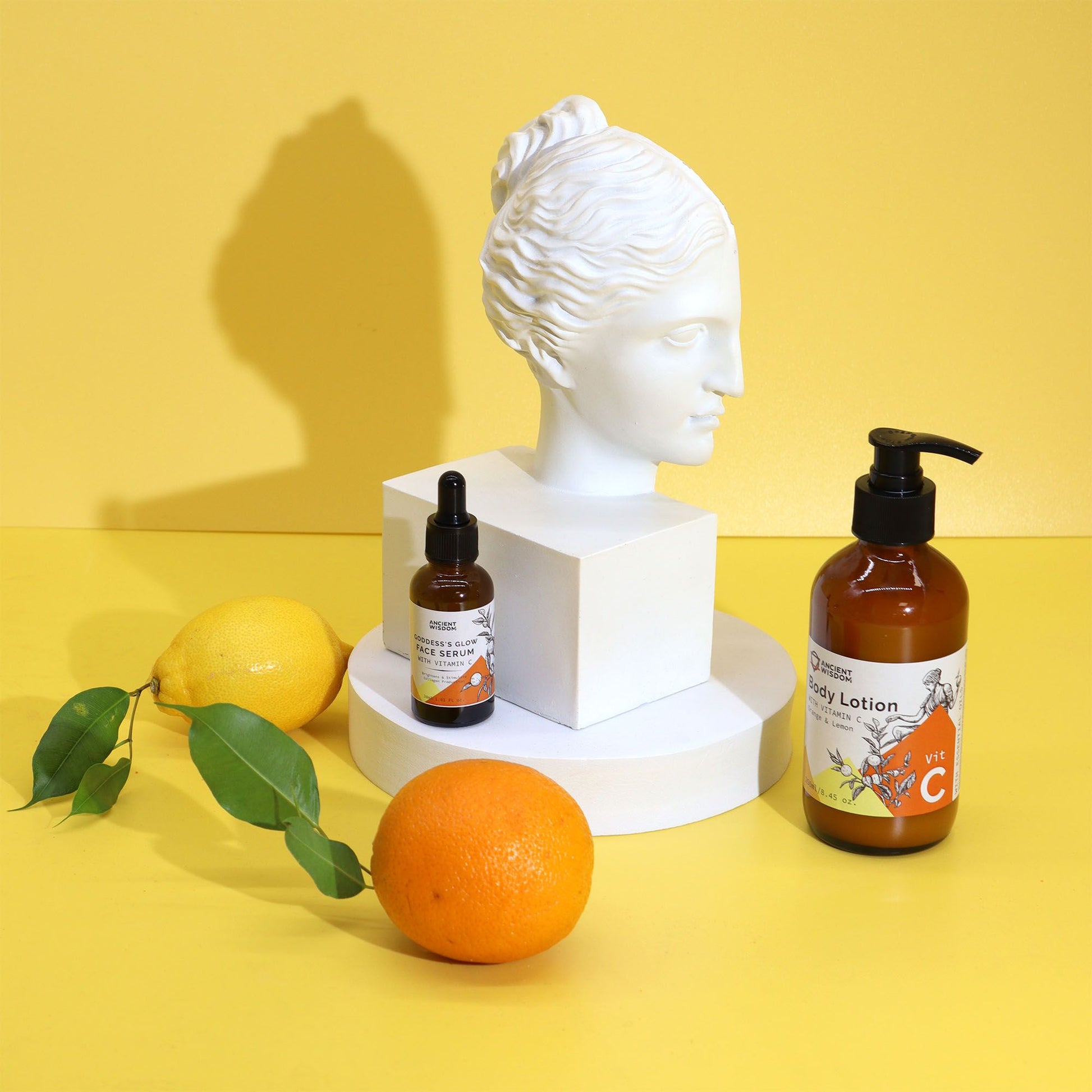 The Bliss Co Vitamin C Goddess’s Body Lotion with orange and lemon for brightening and nourishing skin, shown in a sleek bottle.