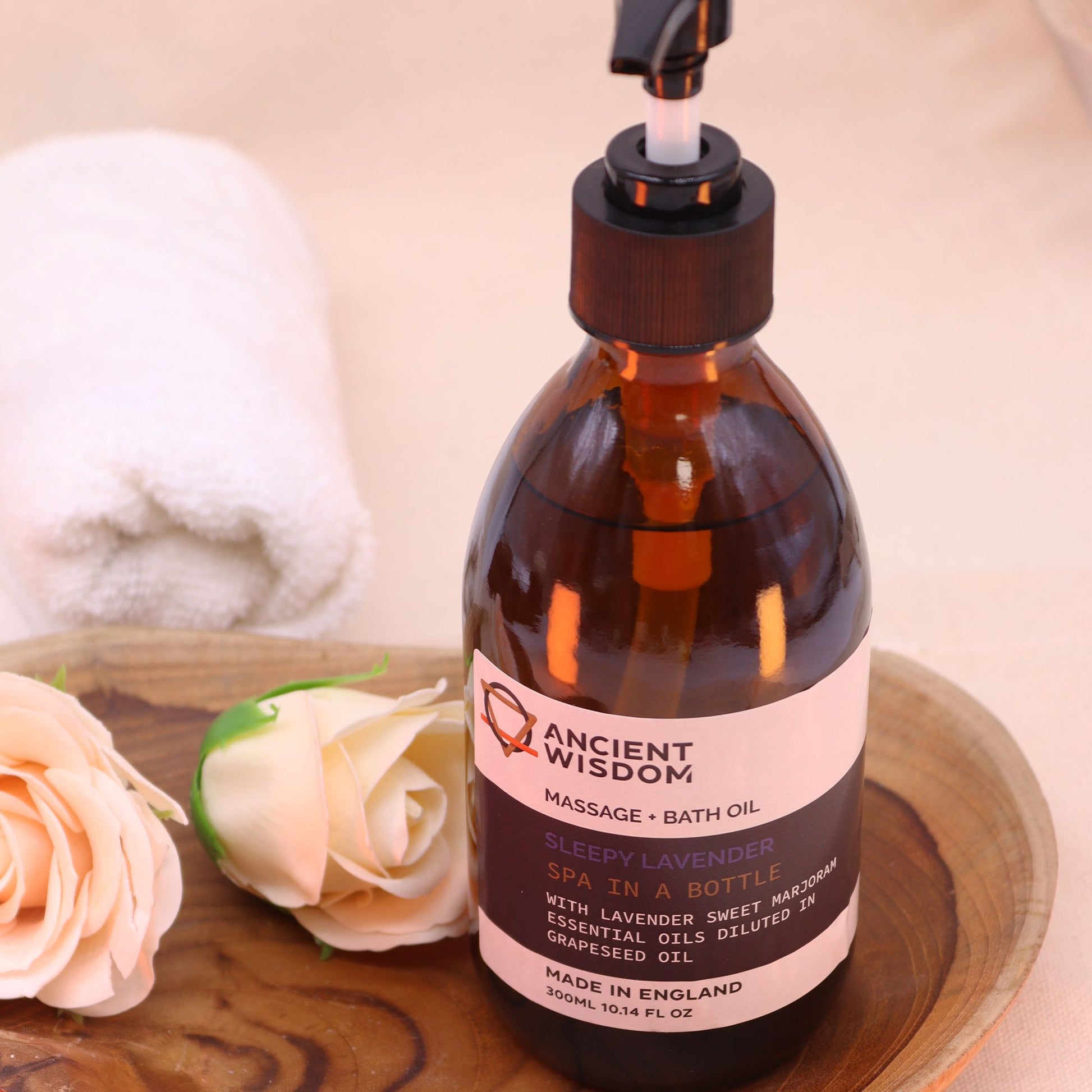 The Bliss Co Sleepy Lavender 300ml aromatherapy massage and bath oil with pump, featuring a lavender-scented bottle for relaxation.