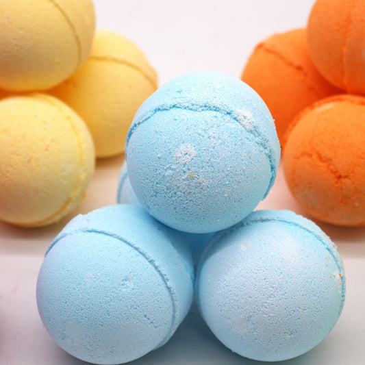 Lavender and marjoram essential oil bath bomb from The Bliss Co, showing a colorful, aromatic bath bomb with herbal scents.