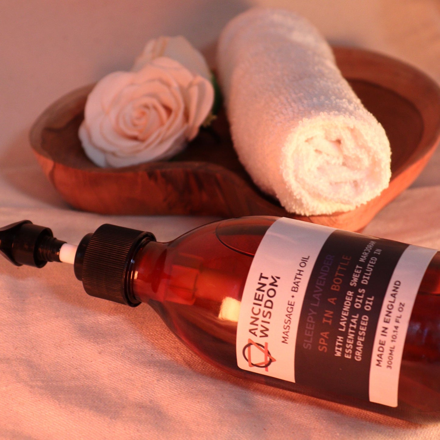 The Bliss Co Sleepy Lavender aromatherapy massage and bath oil in a 300ml bottle with pump for relaxing spa treatments.