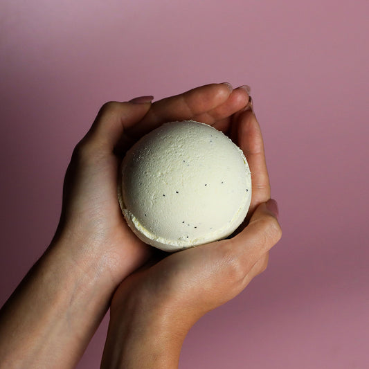 Set of 3 Simply Vanilla Jumbo Bath Bombs by The Bliss Co, 180g each, with colorful packaging and smooth, rounded shapes.