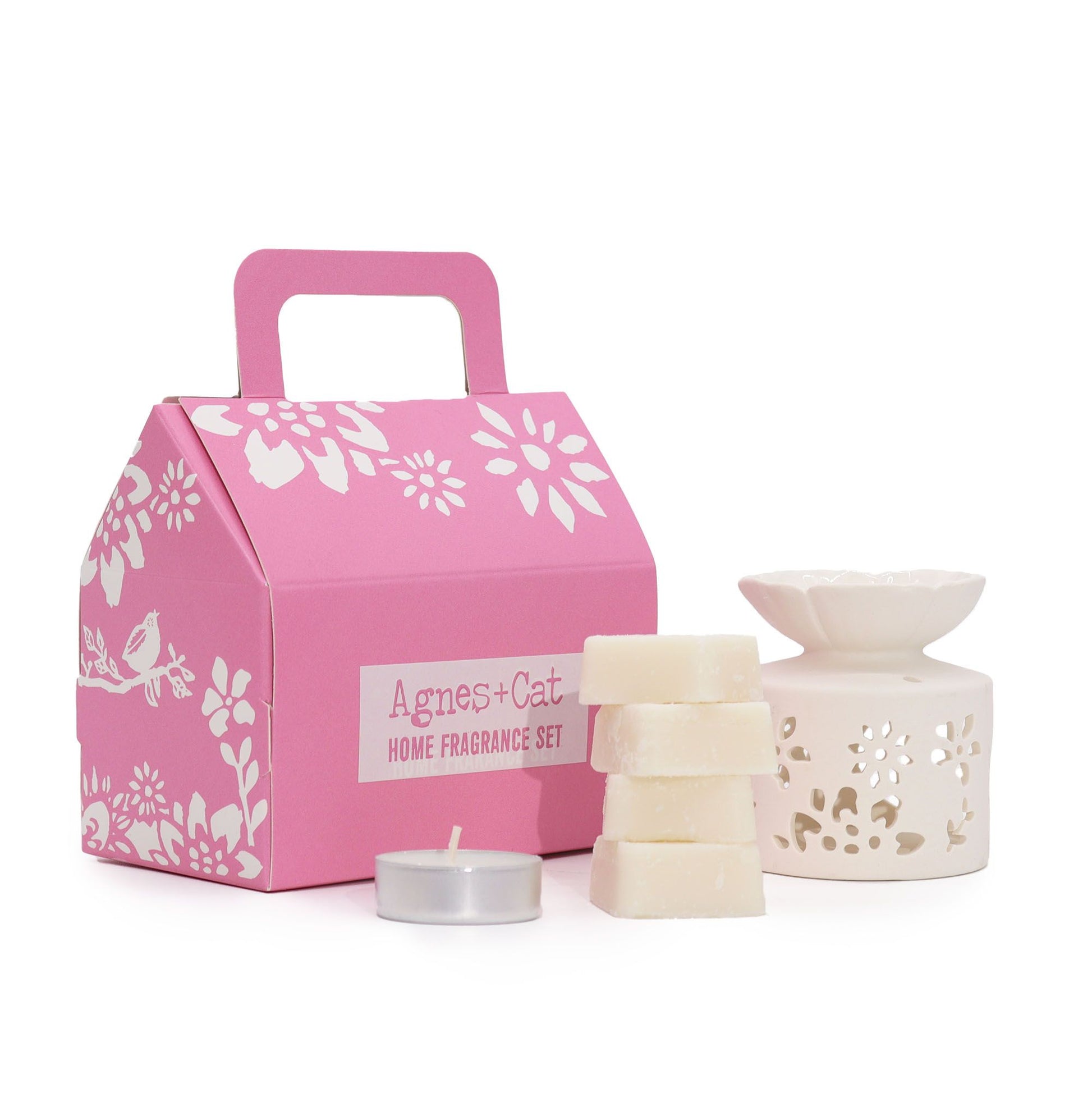 Agnes + Cat Tea & Roses fragrance gift set by The Bliss Co featuring elegant packaging and fragrance bottles with floral design
