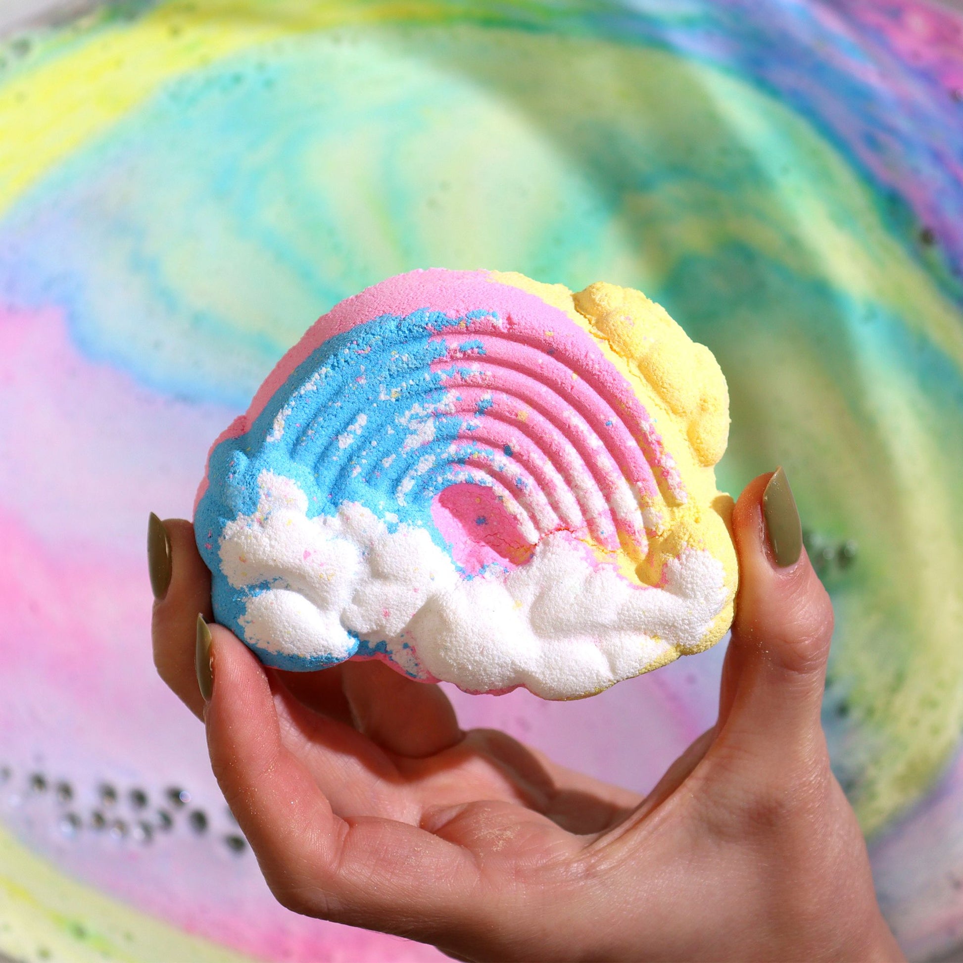 Colorful Cloud Bathbomb 95g by The Bliss Co, shaped bath bomb for kids with vibrant, playful design in a relaxing bath setting.