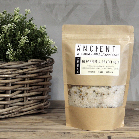Himalayan Bath Salt Blend by The Bliss Co in a 500g container, showing pink Himalayan salt crystals for skin rejuvenation.
