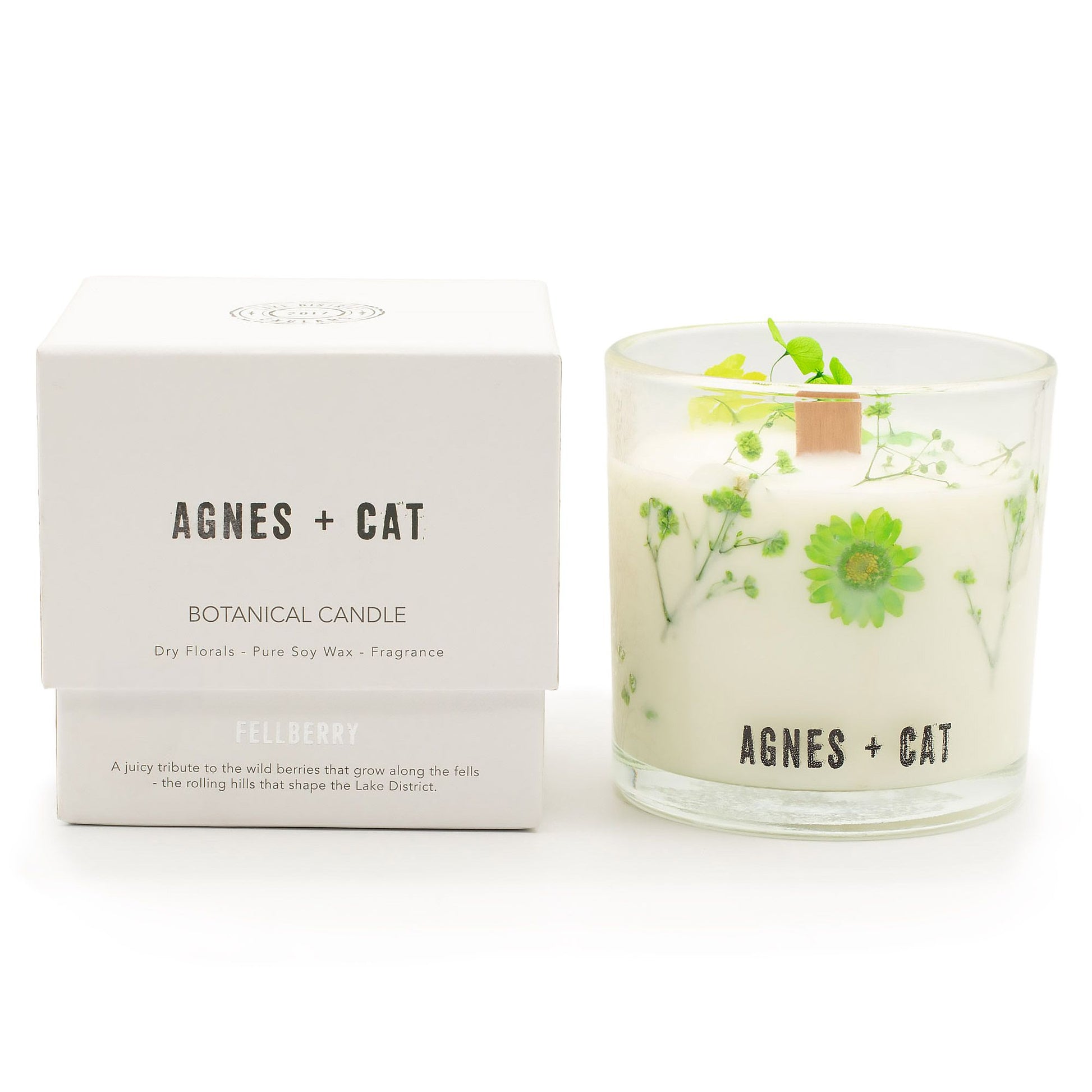 Agnes + Cat Botanical Soy Wax Candle in Fellberry scent, natural soy wax with floral and berry fragrance, displayed in a glass holder.