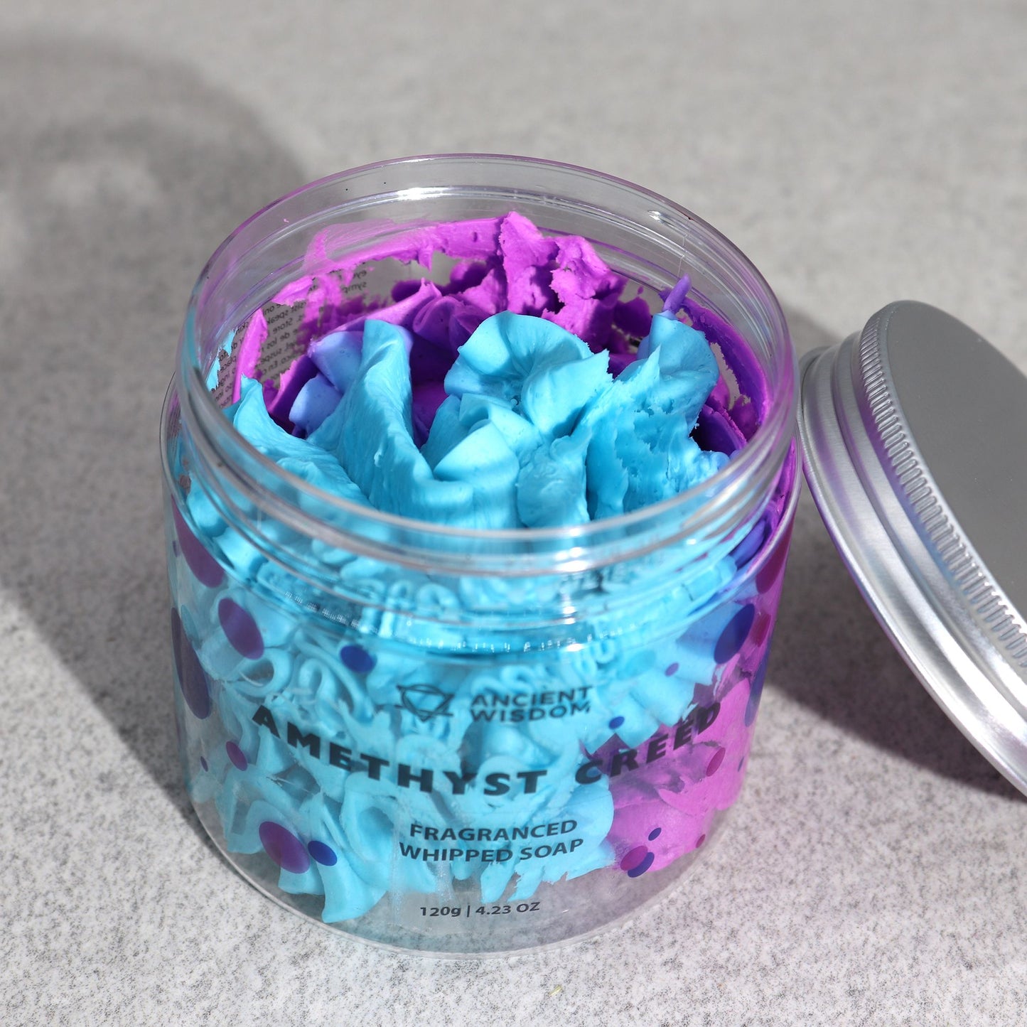 Amethyst Creed whipped soap by The Bliss Co in a 120g jar, showcasing its light, fluffy texture and lavender-purple hue.
