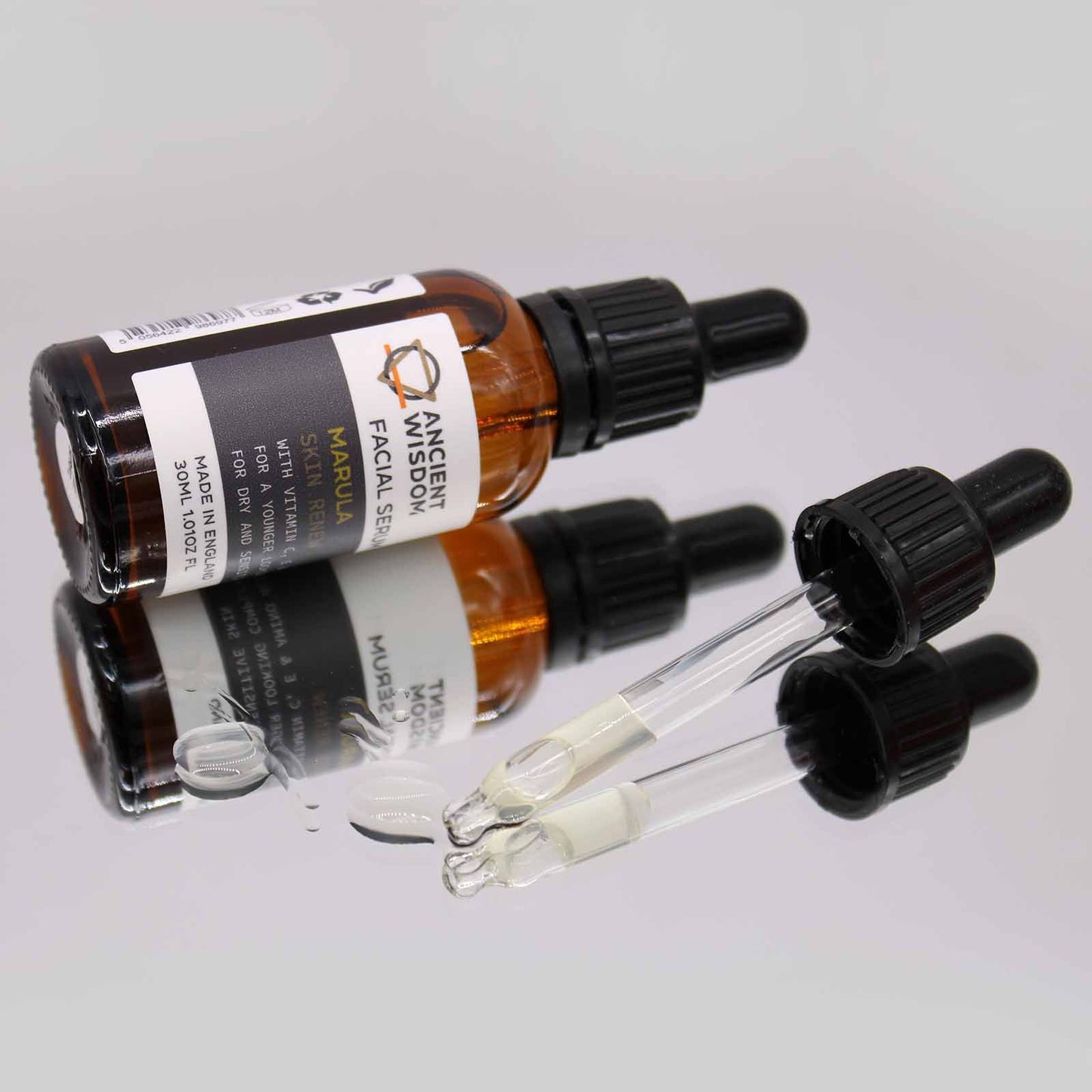 The Bliss Co Vitamin C Face Serum bottle with dropper, showing bright orange liquid and clear packaging.