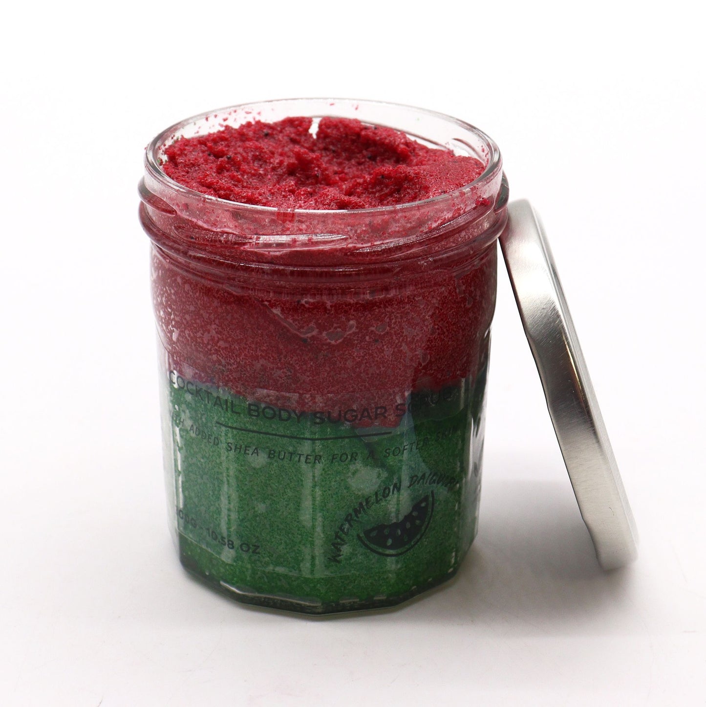The Bliss Co Watermelon Daquiri fragranced sugar body scrub in a 300g jar with pink and white packaging, showing the textured scrub inside.
