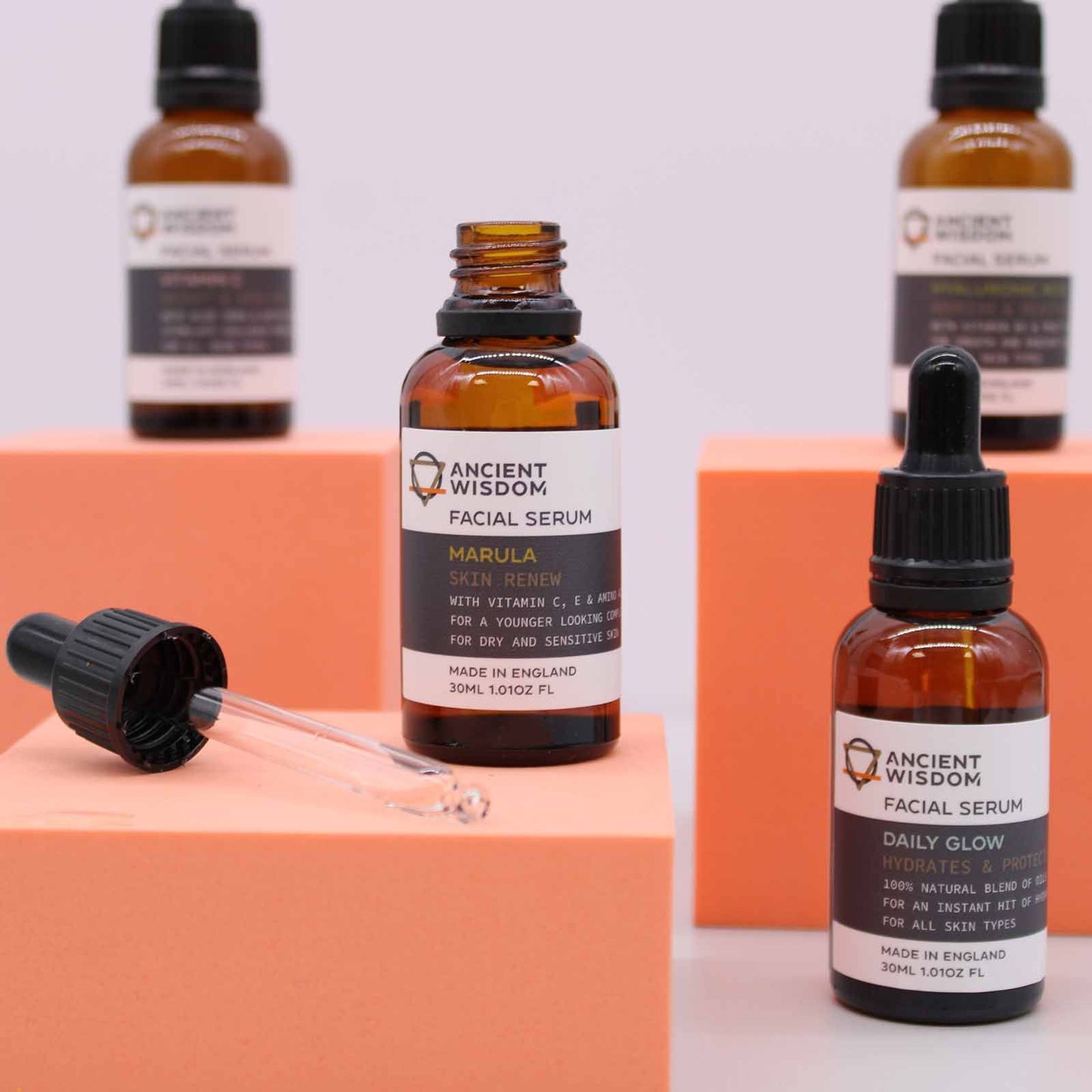 The Bliss Co Vitamin C Face Serum in a clear glass bottle with a pump dispenser, designed for brightening and nourishing skin.