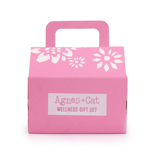 Agnes + Cat Wellness Gift Set by The Bliss Co featuring calming herbal products in a gift box with floral accents.