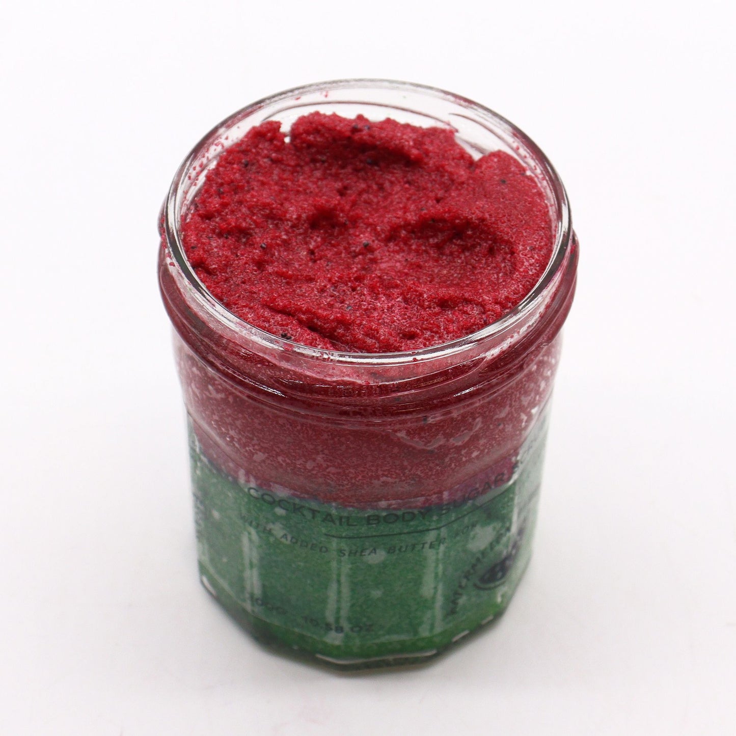 The Bliss Co Watermelon Daquiri fragranced sugar body scrub in a 300g jar with watermelon slices and exfoliating sugar crystals.