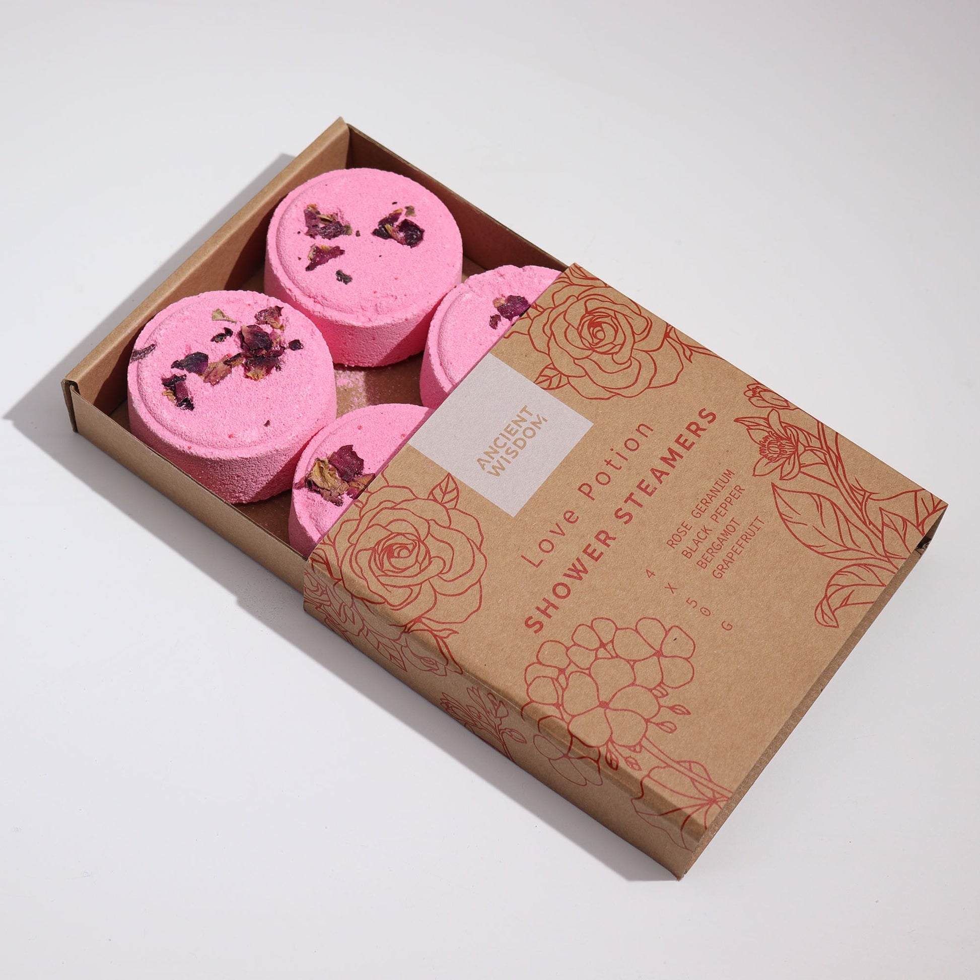 The Bliss Co Zen Shower Steamers Therapy Wellness Gift Set with Love Potion scent, featuring colorful shower steamers in a box.