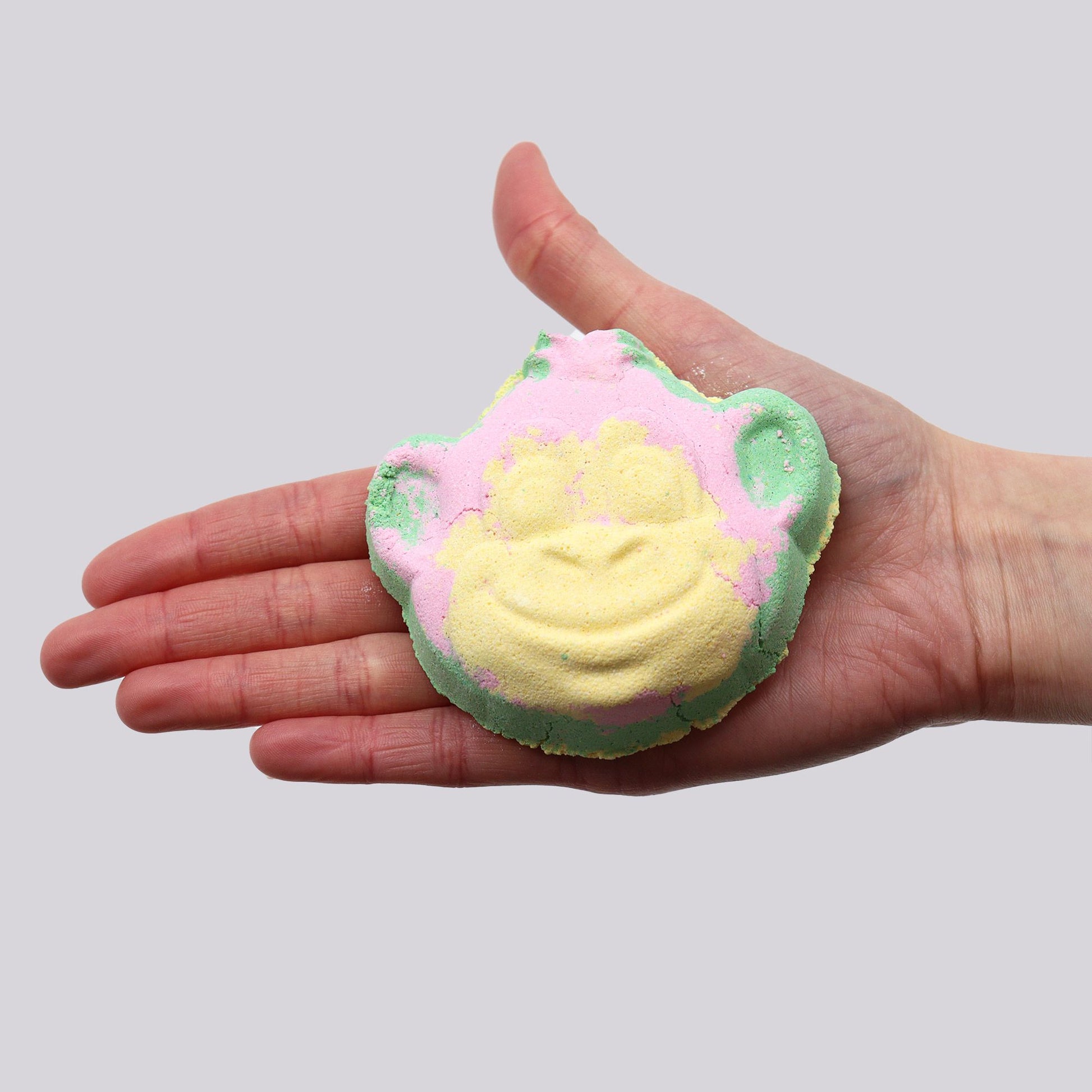 Colorful shaped Monkey bath bomb for kids by The Bliss Co, 90g, with vibrant swirls and playful design for fun bath time experiences.