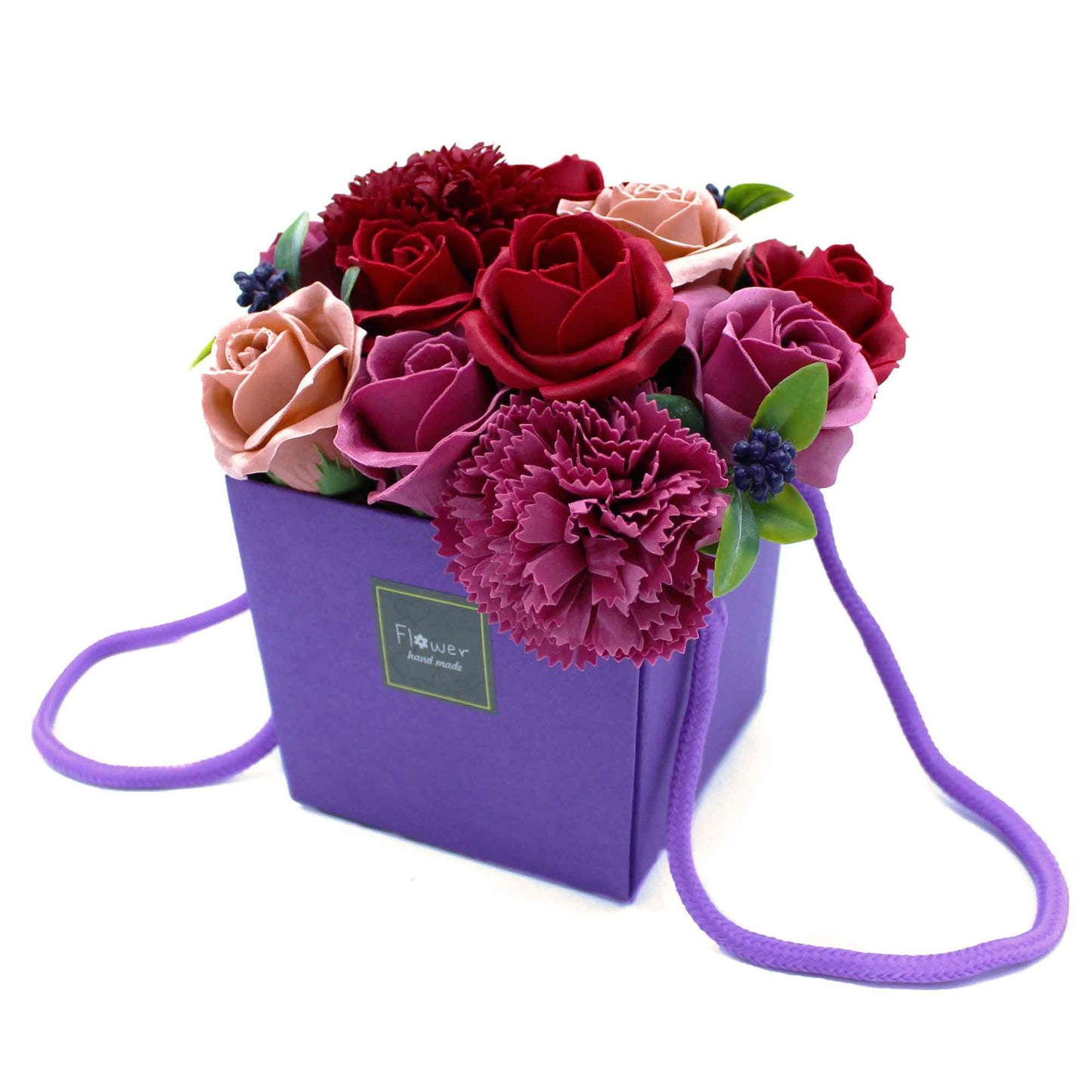 Luxury soap flower bouquet featuring purple soap flowers from The Bliss Co, arranged in a decorative flower garden display.
