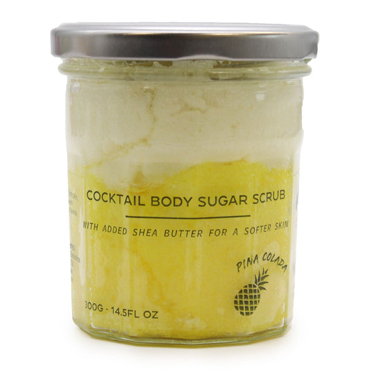 The Bliss Co fragranced sugar body scrub in Pinacolada scent, 300g, with a textured scrub and tropical fragrance visible.