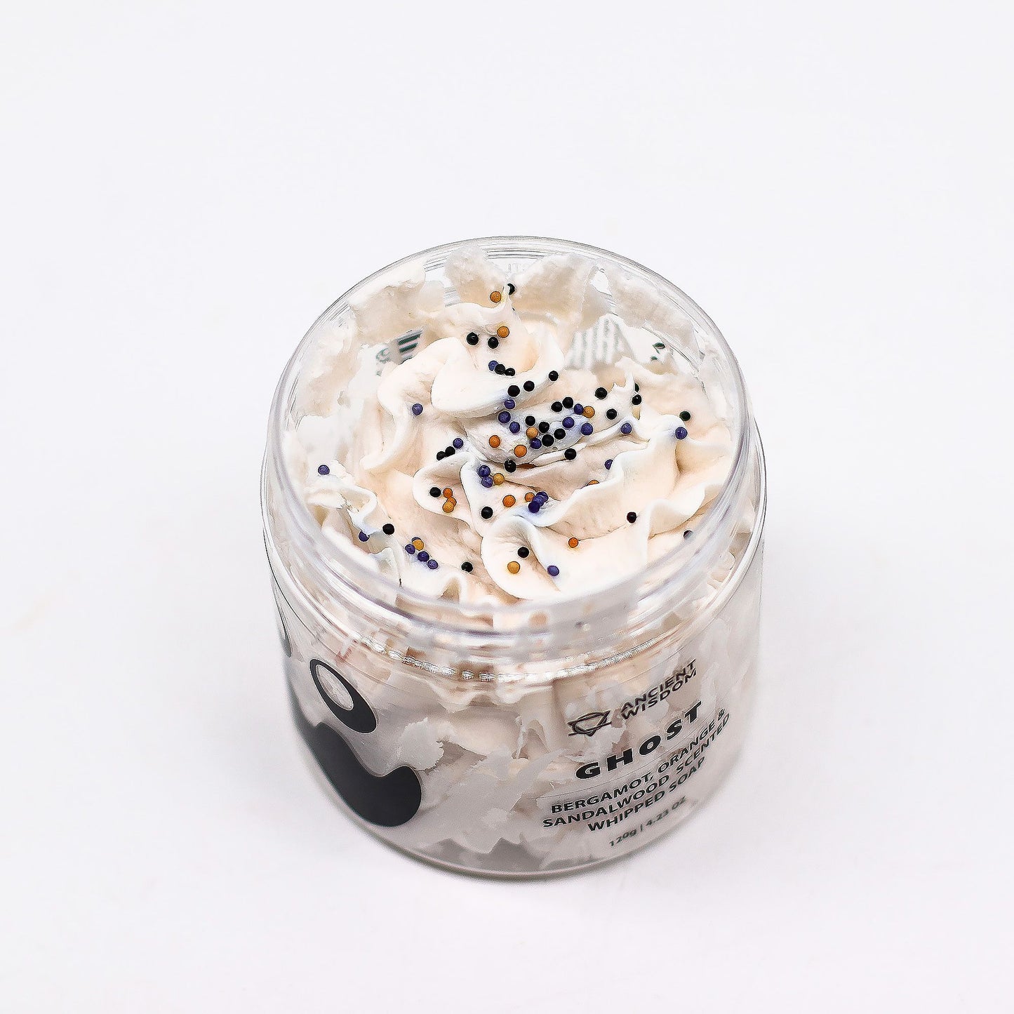 The Bliss Co Ghost Whipped Soap 120g in a fluffy, creamy texture with a ghostly white appearance, perfect for gentle cleansing.