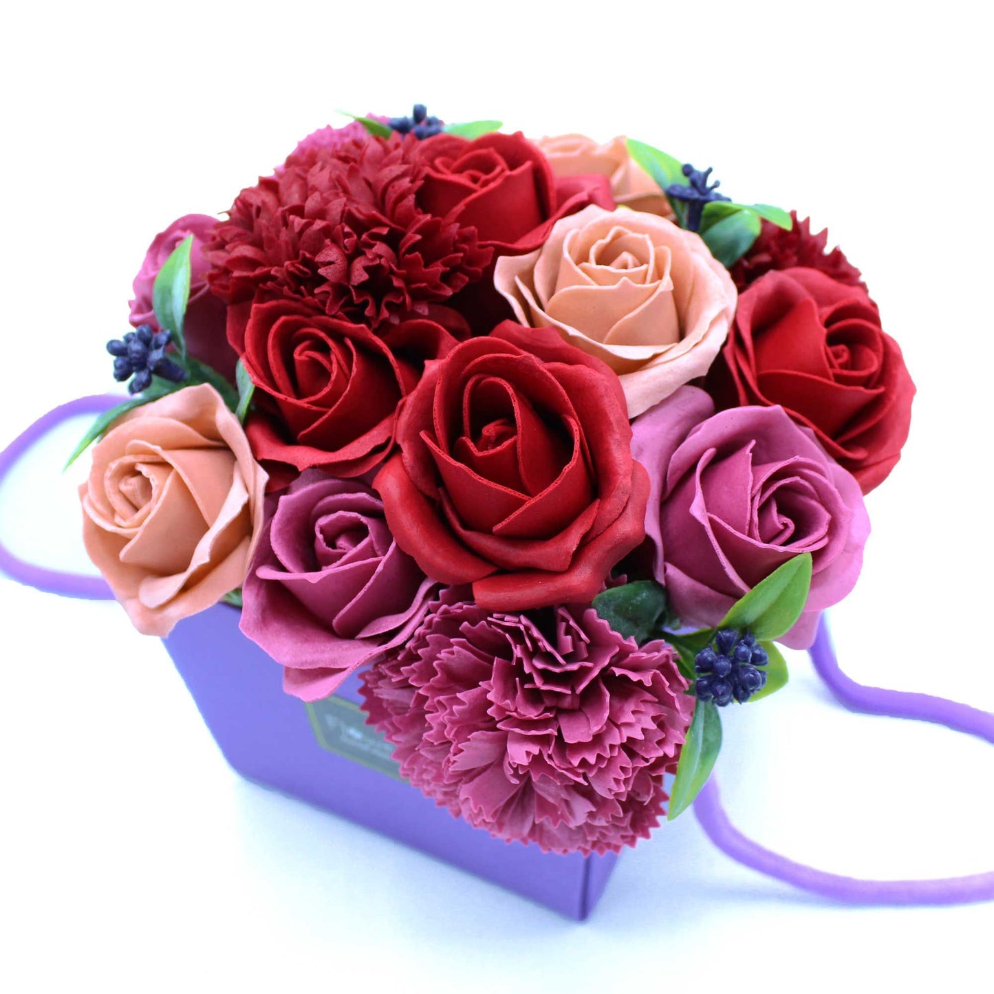 Luxury soap flower bouquet with vibrant purple flowers from The Bliss Co, showcasing a floral arrangement in a garden-inspired design.