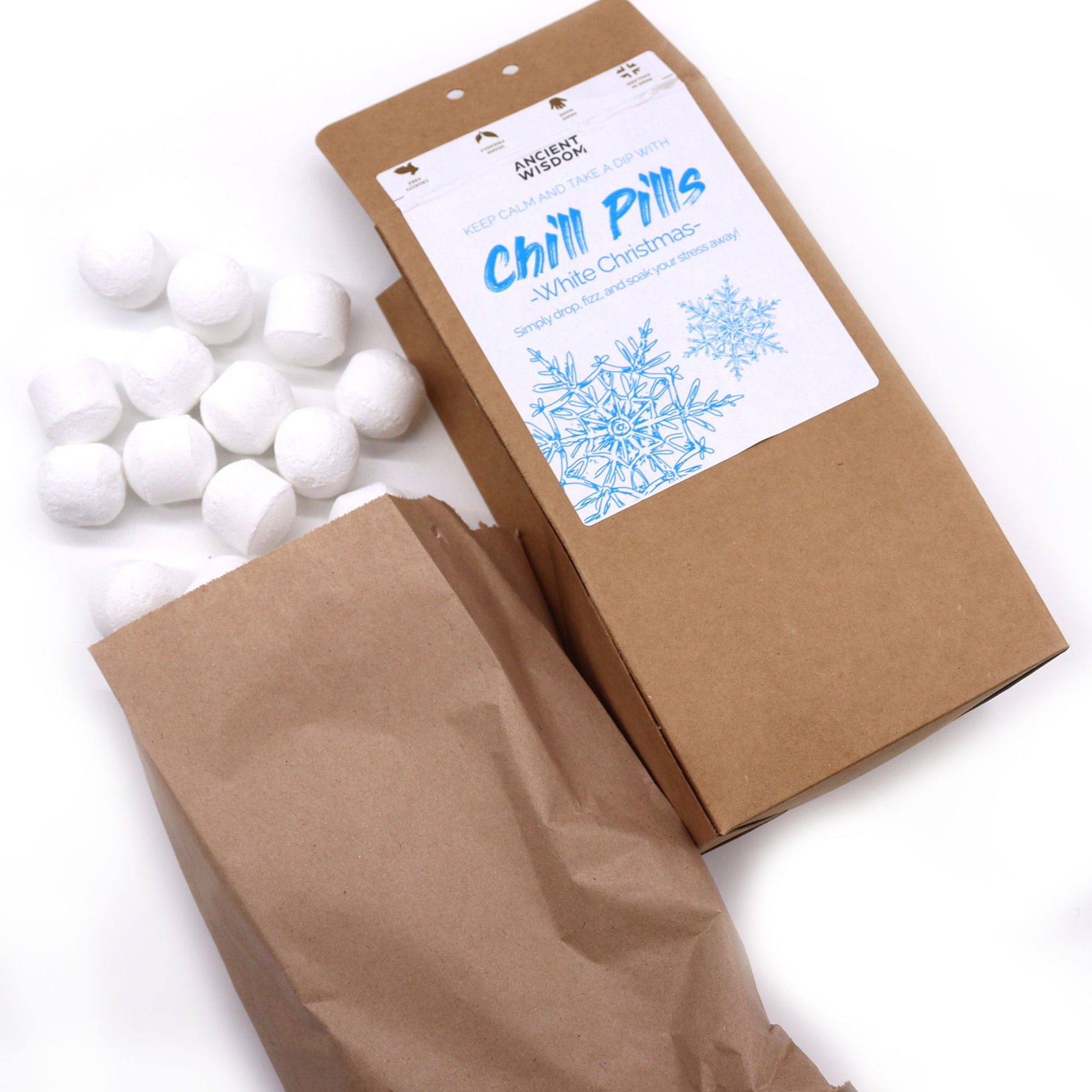 Chill Pills gift pack by The Bliss Co featuring white Christmas-themed packaging and 350g of relaxing herbal supplements.
