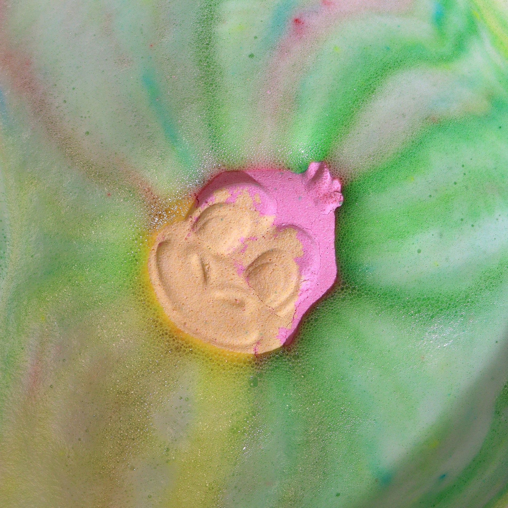 Colorful Monkey Bathbomb by The Bliss Co, shaped for kids, 90g, with vibrant swirls and playful design for a fun bath experience.