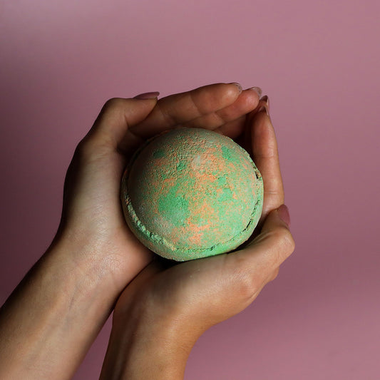 Set of three Hawaiian Mango jumbo bath bombs by The Bliss Co, 180g each, showing colorful round bath bombs with tropical mango scent.