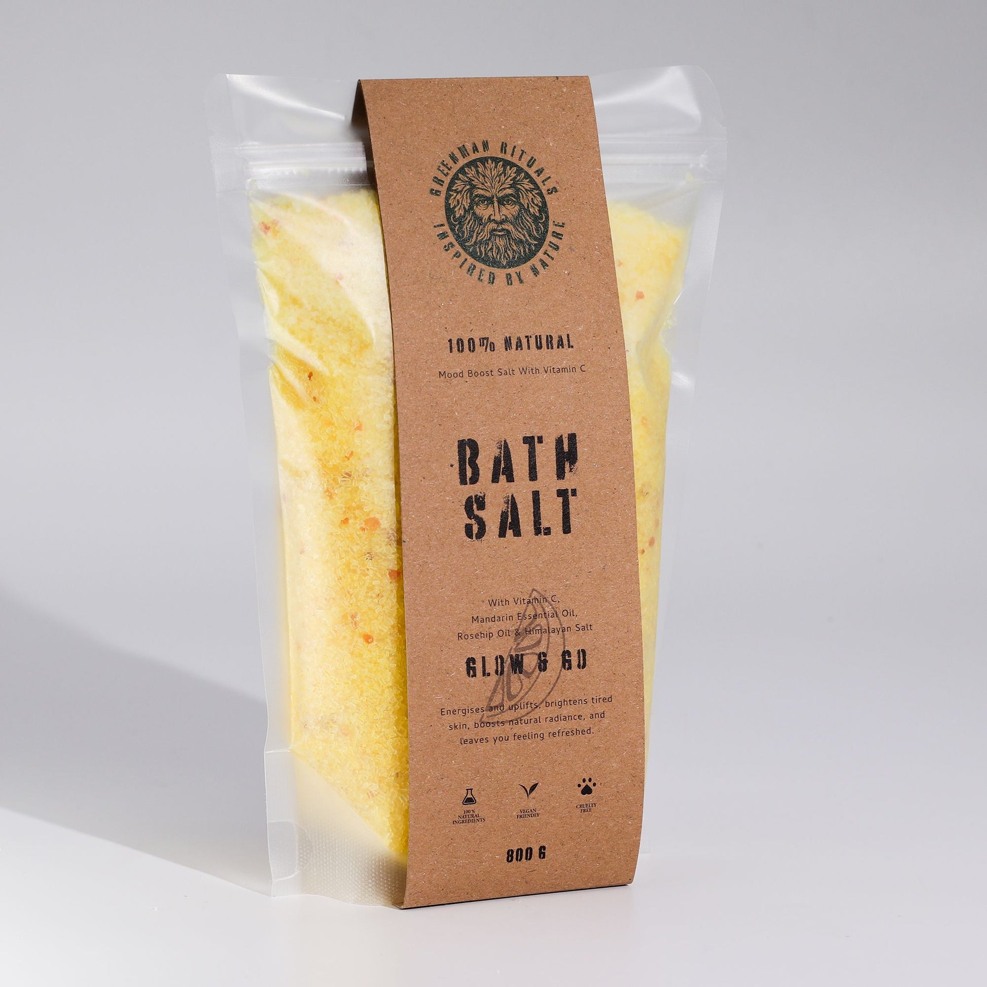 Greenman Rituals Vitamin C & Mandarin Epsom Bath Salts by The Bliss Co, featuring vibrant orange and green bath salts with citrus scent.