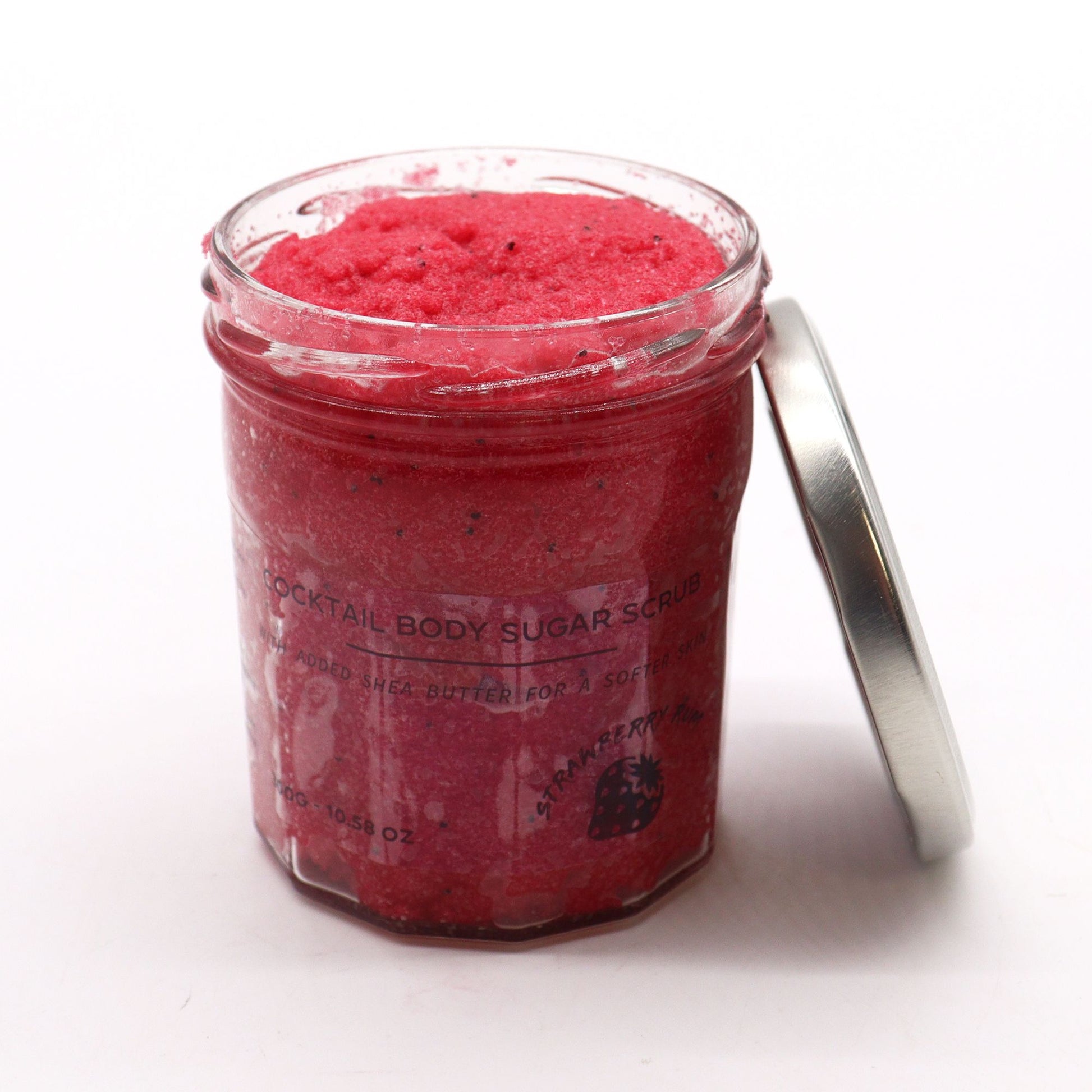 Fragranced Sugar Body Scrub with strawberry rum scent by The Bliss Co, showing the jar of 300g exfoliating scrub.