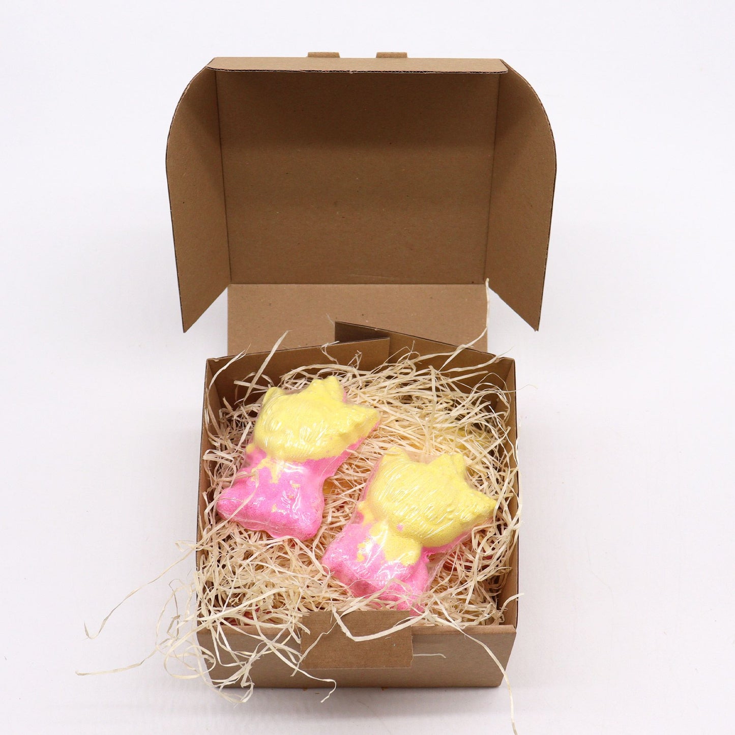 Colorful shaped bath bomb for kids from The Bliss Co, designed for a fun and relaxing bath experience, weighs 80g.