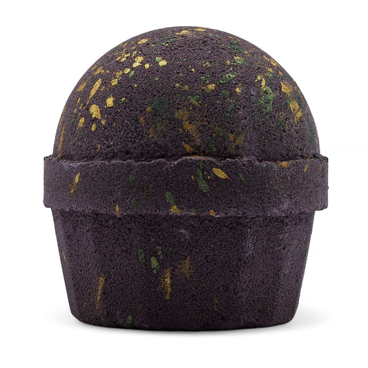Dubai Bath Bomb by The Bliss Co, emerald oudh truffle scent, jumbo 180g bath bomb with vibrant green color in a spa setting.