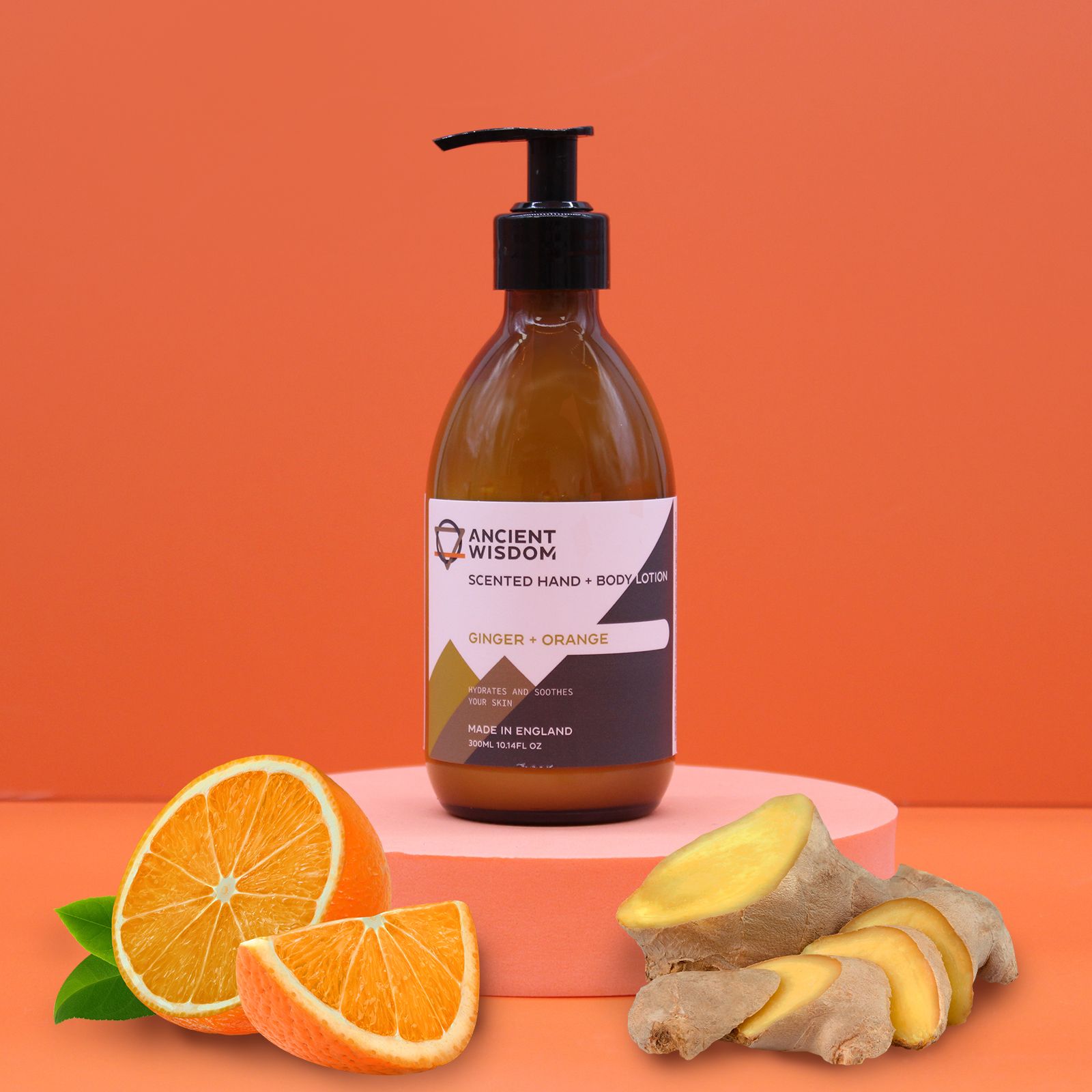 Ginger & Orange fragranced hand and body lotion by The Bliss Co in a 300ml bottle, showcasing the lotion's smooth texture and vibrant packaging.