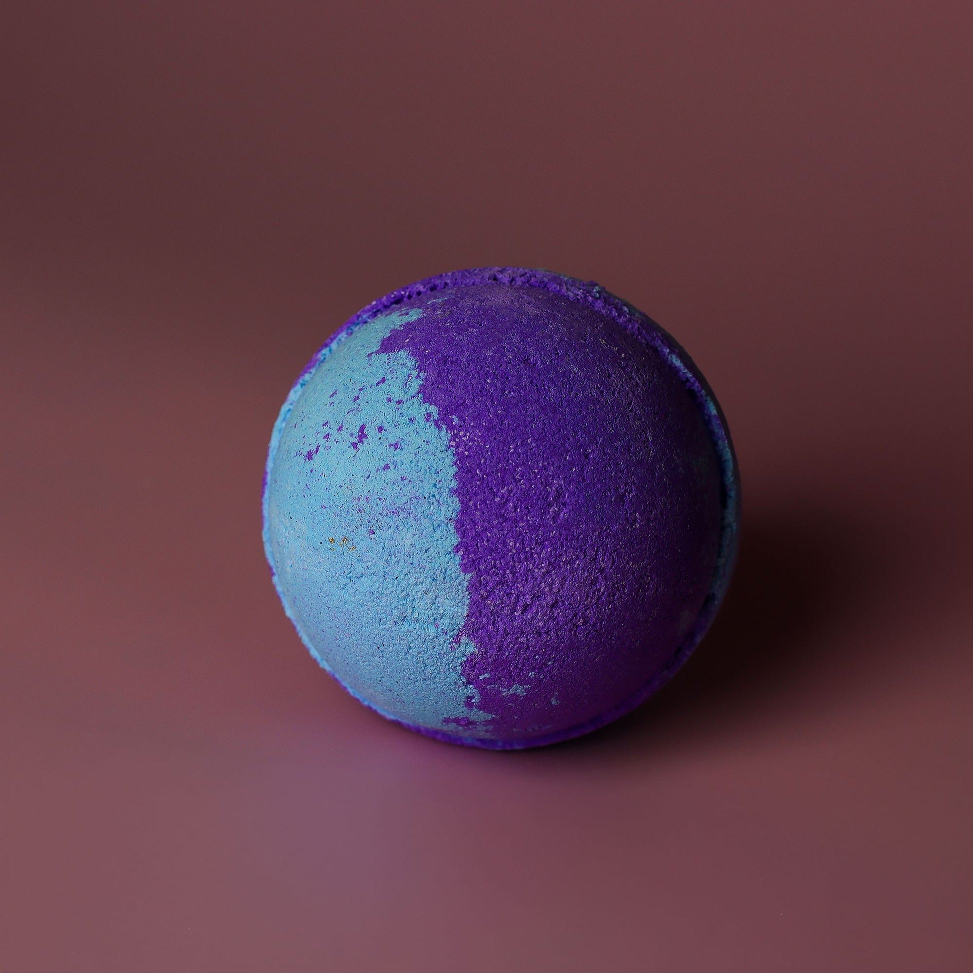 Jumbo Amethyst Creed bath bomb by The Bliss Co, 180g, with vibrant purple colors and a calming, gemstone-inspired design.