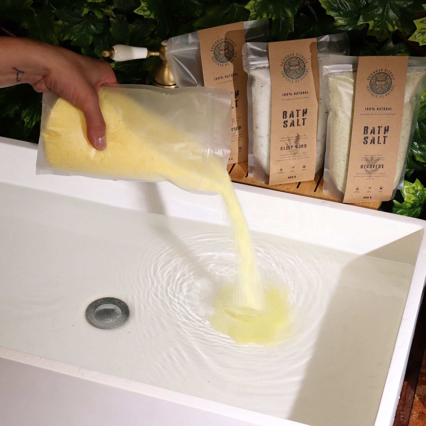 Greenman Rituals Vitamin C & Mandarin Epsom Bath Salts from The Bliss Co, showing a jar of soothing, citrus-scented bath salts.
