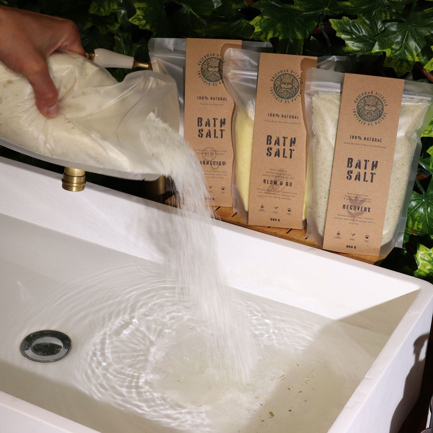 Greenman Rituals Oat & Honey Epsom Bath Salt from The Bliss Co, showing a jar of soothing green bath salts with oats and honey ingredients.