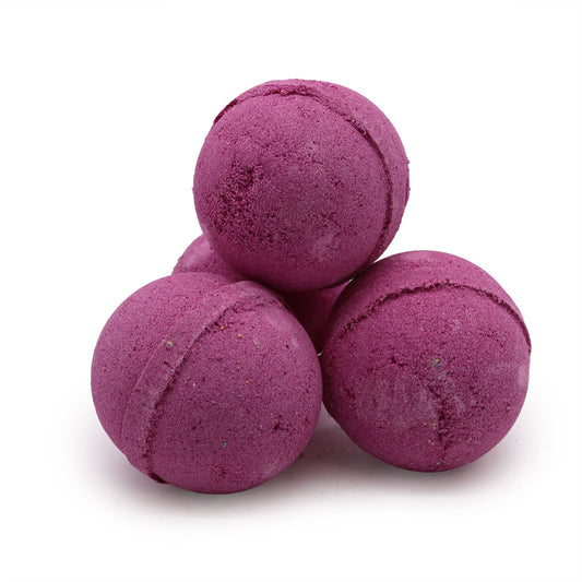 Essential Oils Bath Bomb by The Bliss Co with ylang ylang and ginger, showcasing a colorful, aromatic bath bomb for relaxing baths.