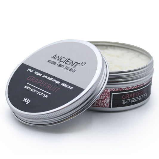 Aromatherapy Shea Body Butter by The Bliss Co in 90g jar, featuring grapefruit scent and creamy texture, close-up view.