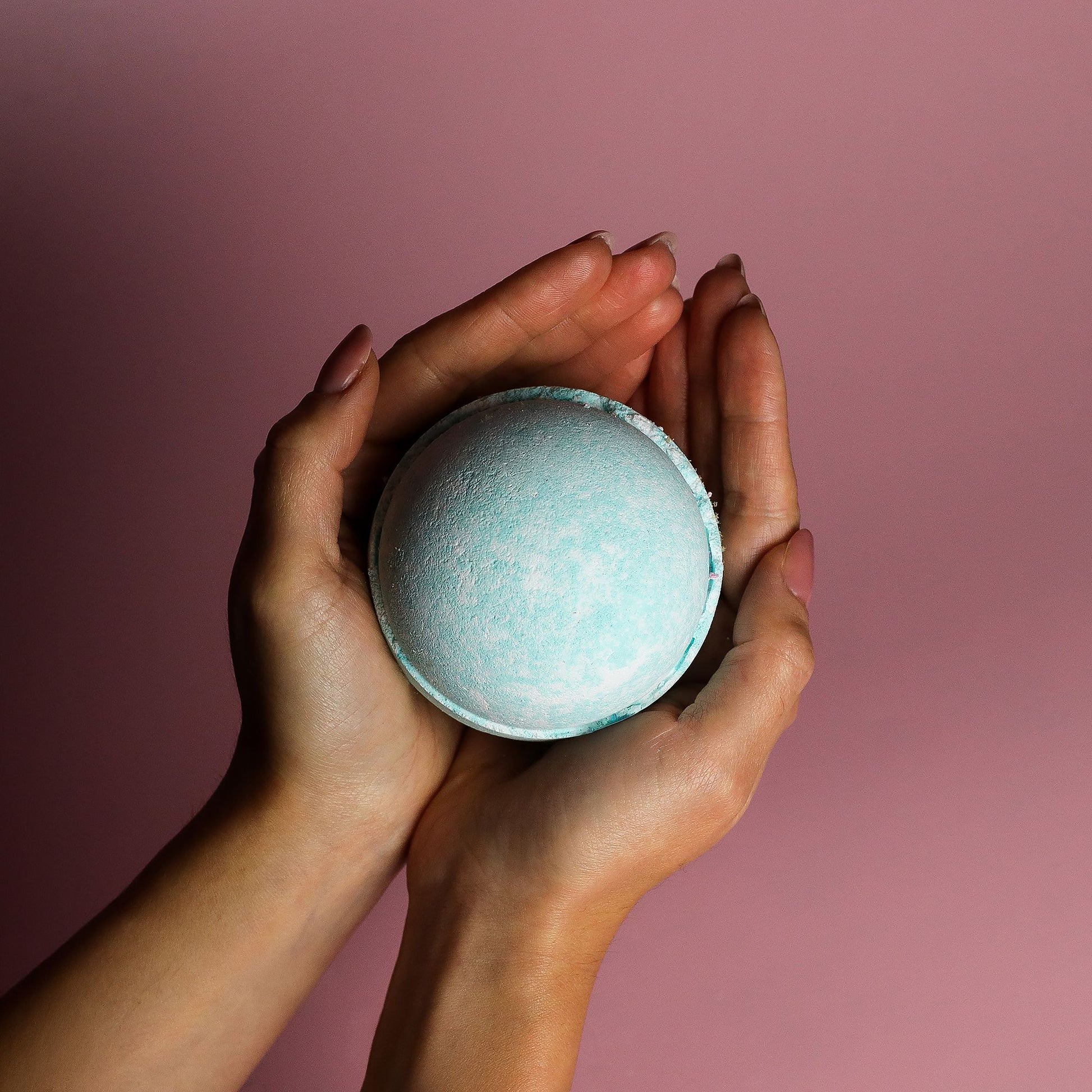 Set of three jumbo Five for Him bath bombs by The Bliss Co, each 180g, showing colorful spherical bath bombs in a spa setting.