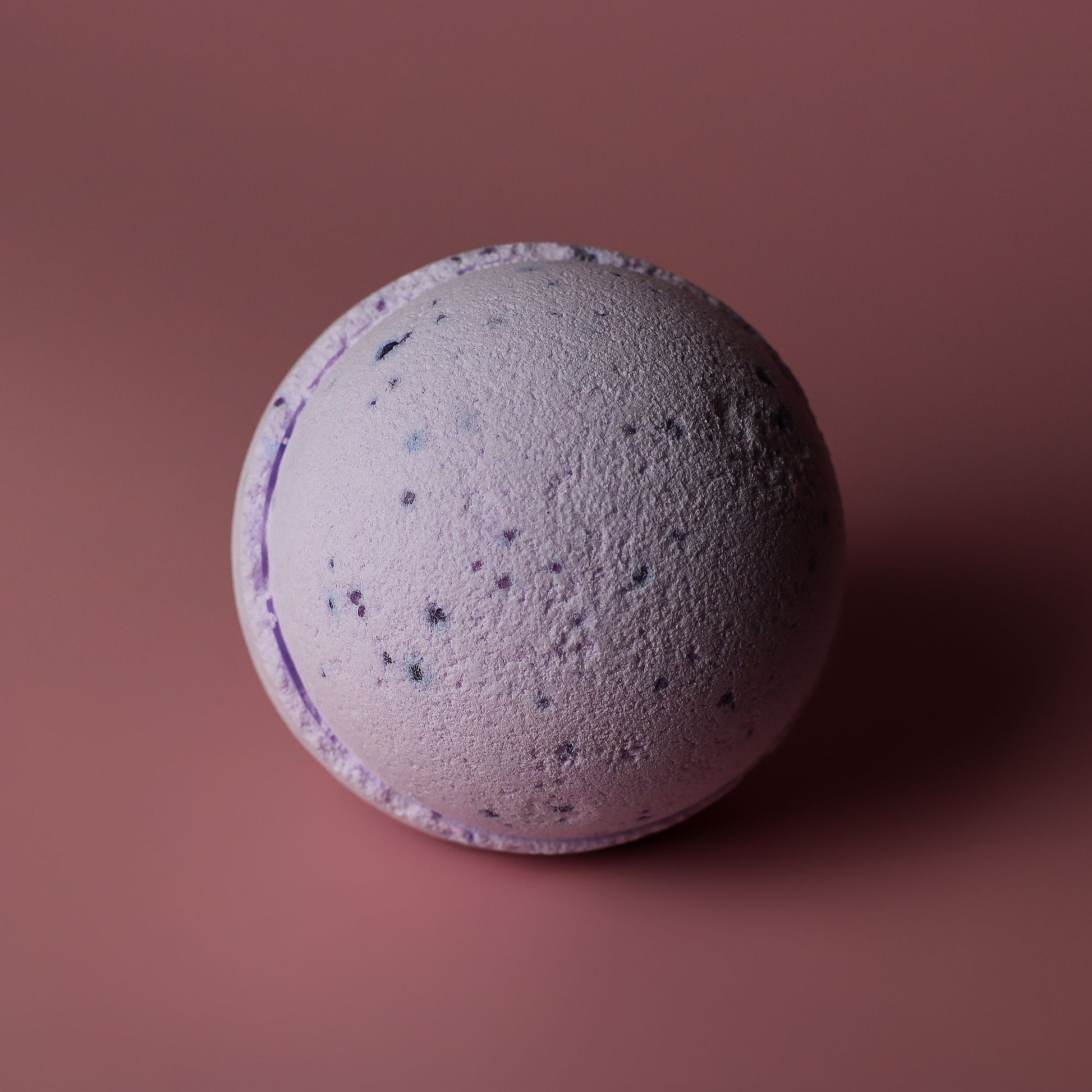 Set of 3 jumbo bath bombs with sweet fennel and jojoba by The Bliss Co, showcasing large, colorful bath bombs in a relaxing spa setting.