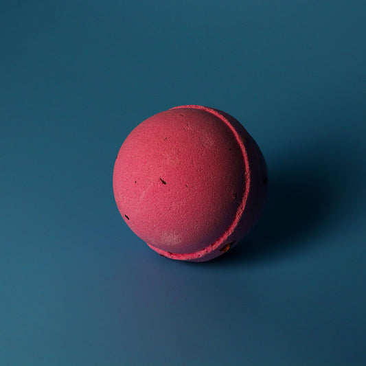 Set of three jumbo Rose and Petals bath bombs by The Bliss Co, showing colorful spherical bath bombs with rose petals inside.