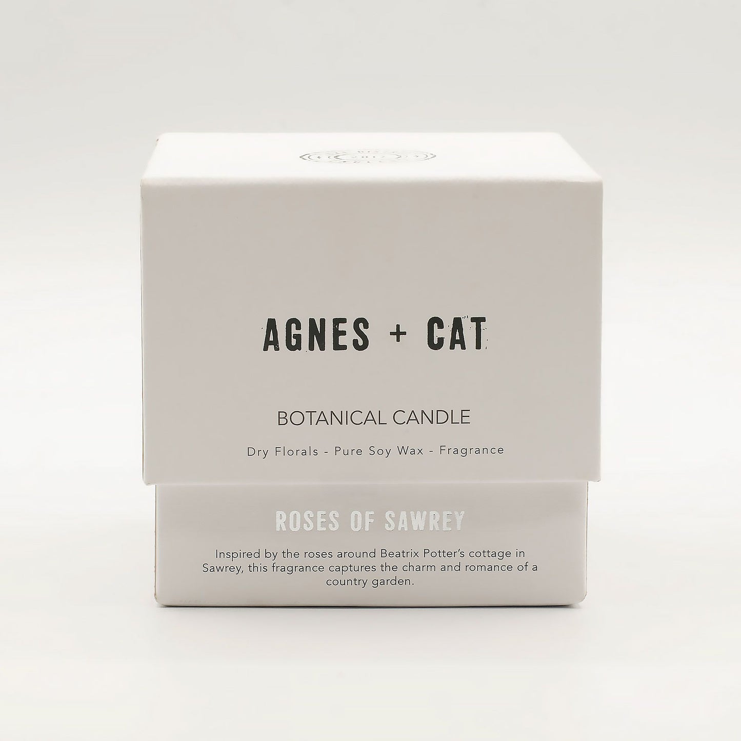 Agnes + Cat Botanical Soy Wax Candle Roses of Sawrey by The Bliss Co, showing a floral soy wax candle in a glass jar with rose design.