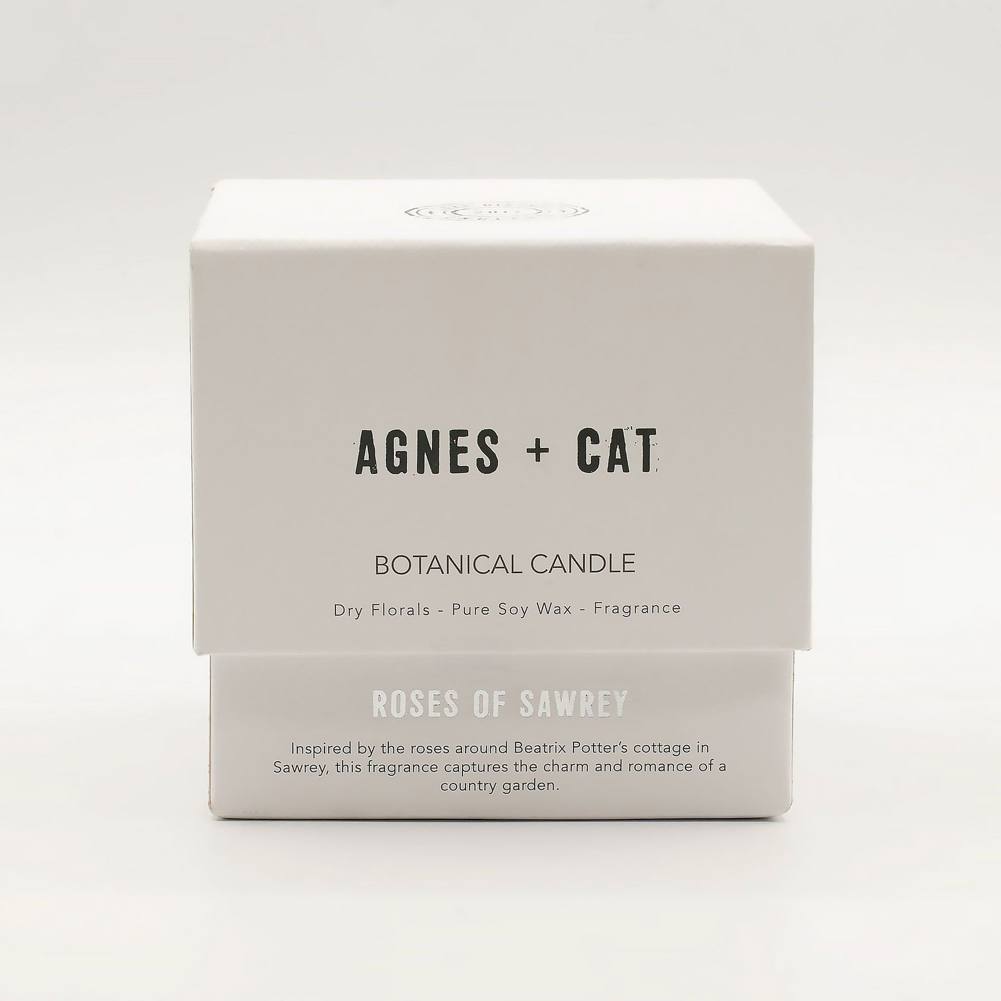 Agnes + Cat Botanical Soy Wax Candle Roses of Sawrey by The Bliss Co, showing a floral soy wax candle in a glass jar with rose design.