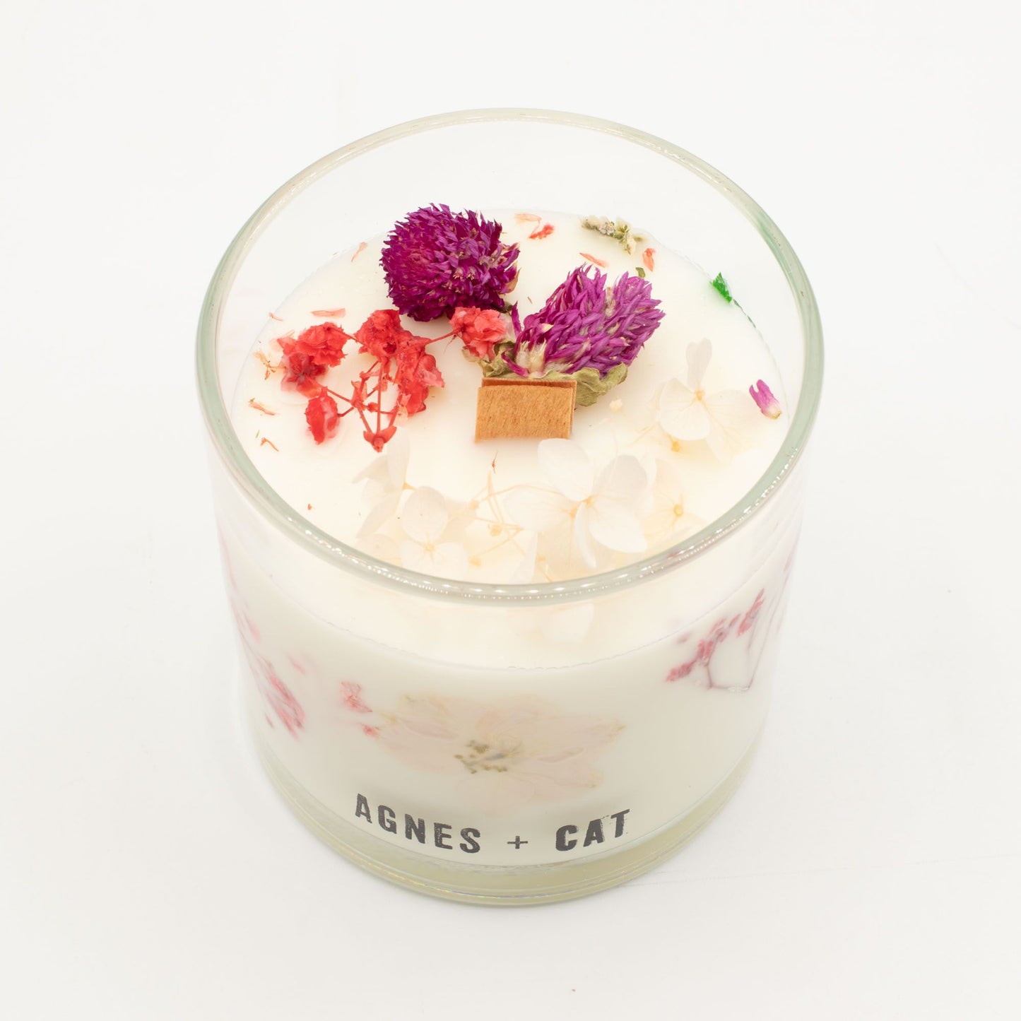 Agnes + Cat Botanical Soy Wax Candle with roses of Sawrey, featuring a glass jar and floral label from The Bliss Co.